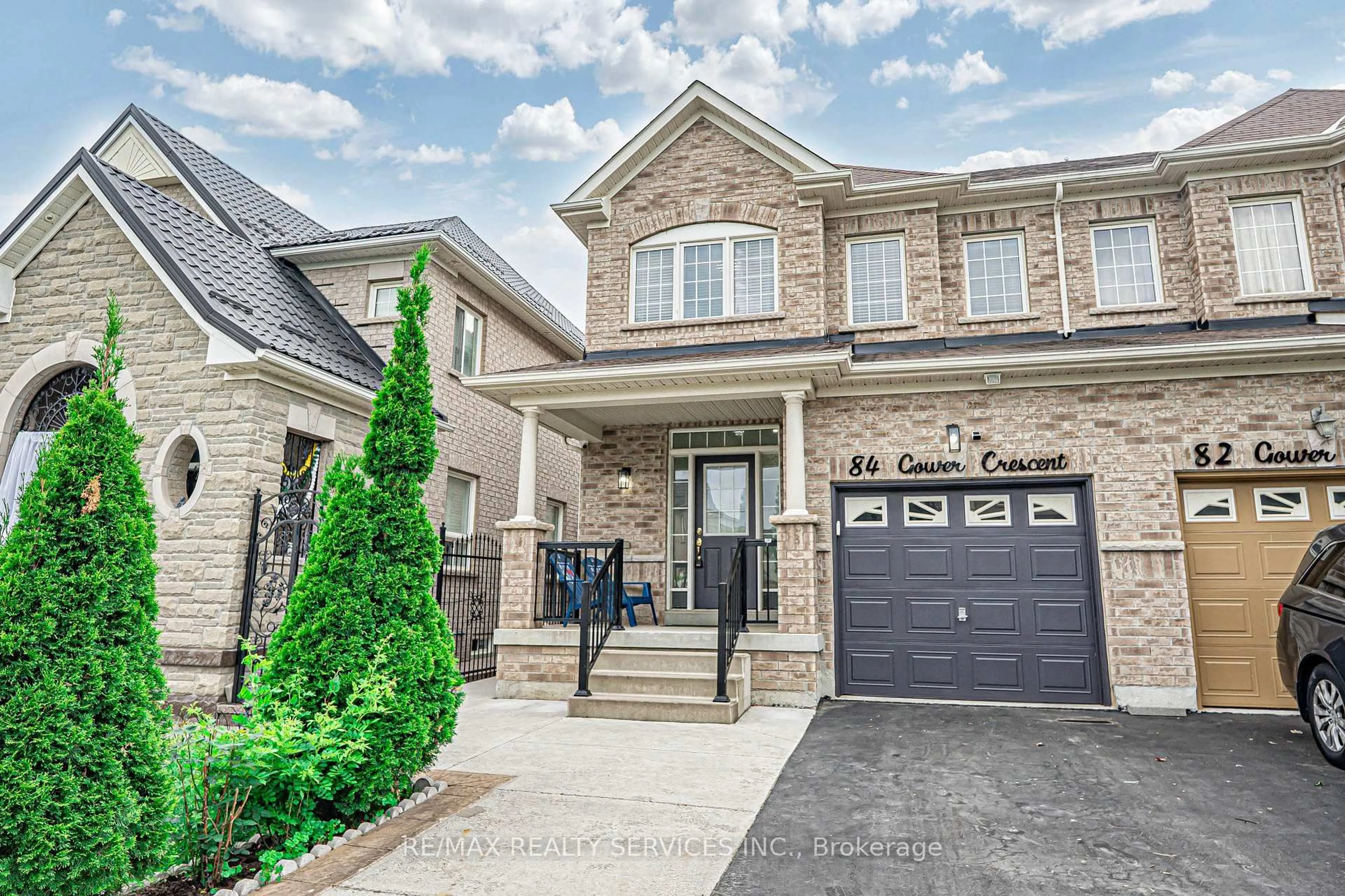 Home with brick exterior material, street for 84 Gower Cres, Brampton Ontario L6R 0X9