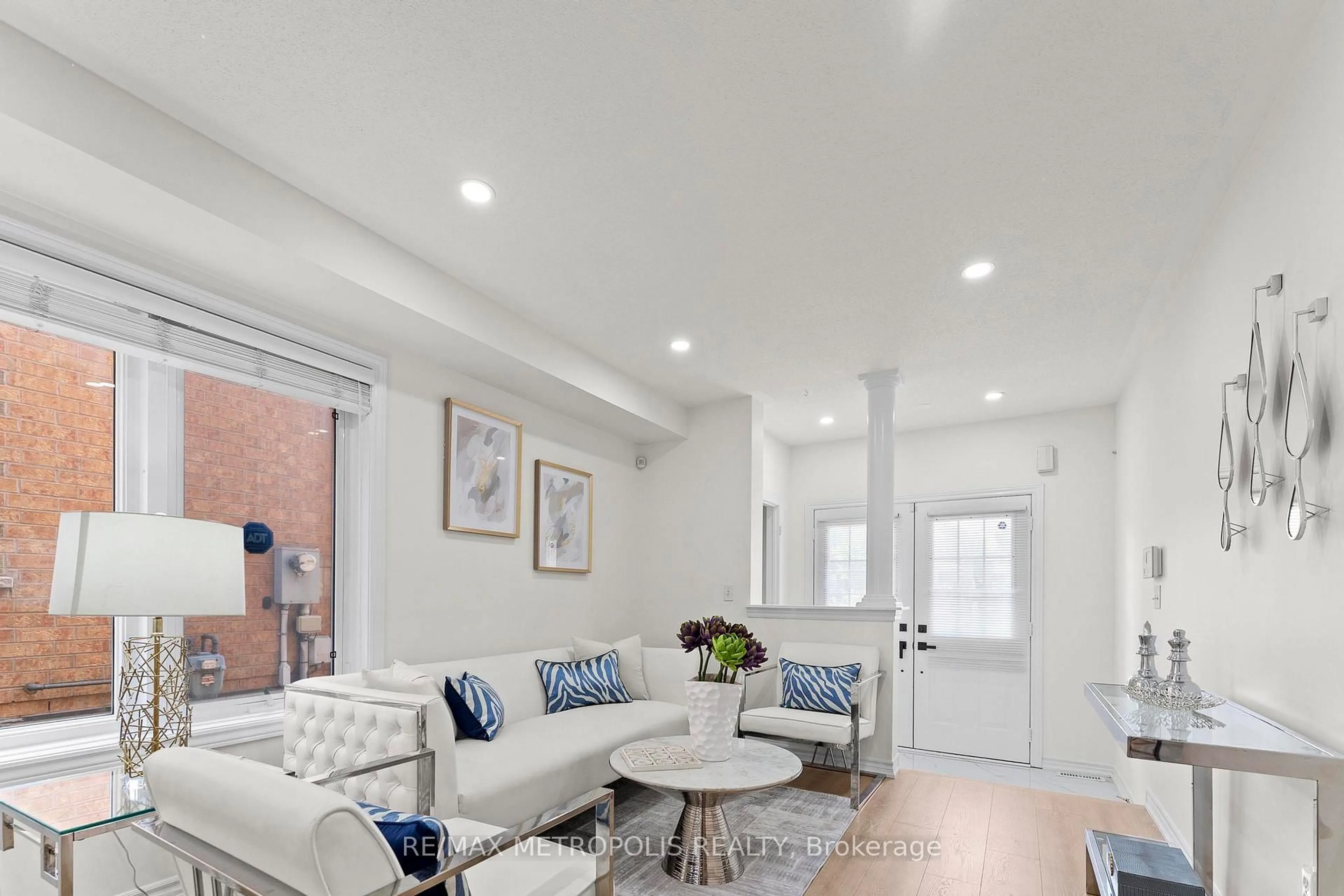 Living room with furniture, ceramic/tile floor for 124 Nahani Way, Mississauga Ontario L4Z 4J8