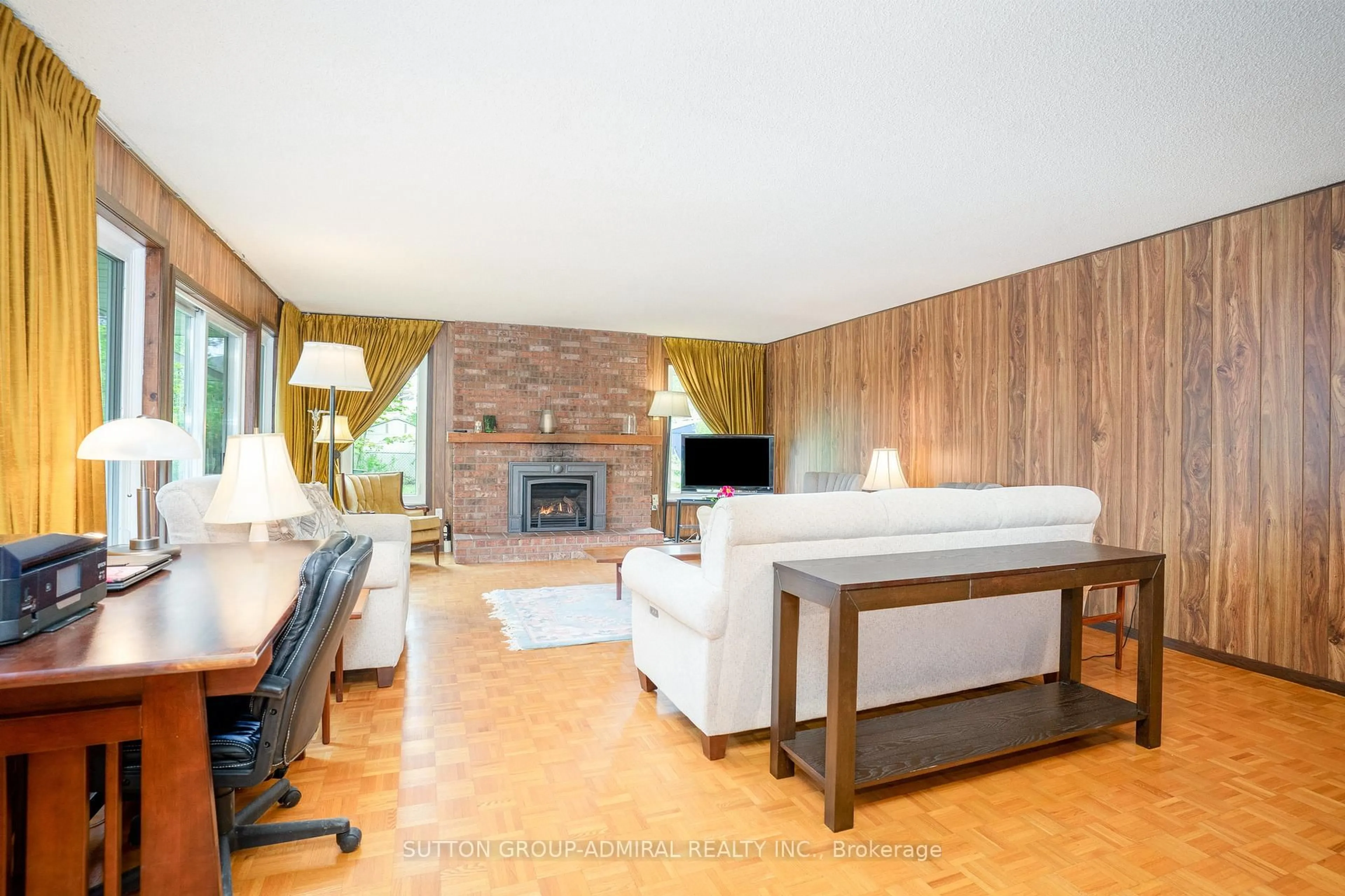 Living room with furniture, wood/laminate floor for 43 Vanderbrent Cres, Toronto Ontario M9R 3W9