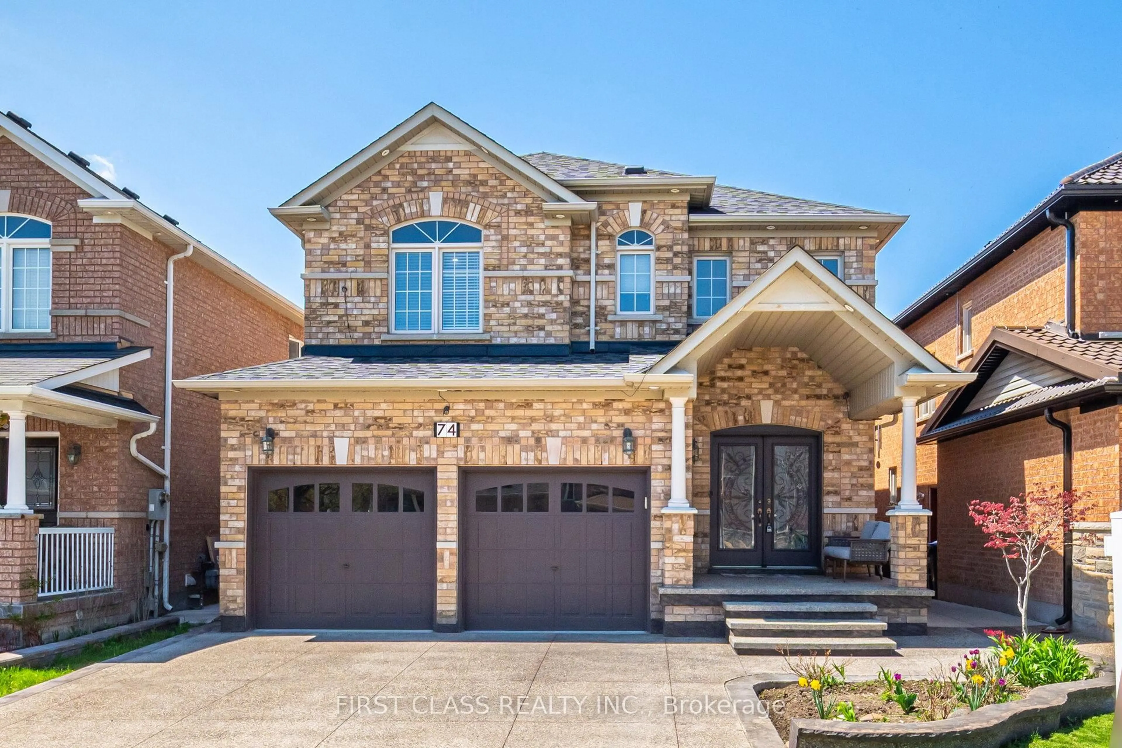 Home with brick exterior material, street for 74 Long Meadow Rd, Brampton Ontario L6P 2A1