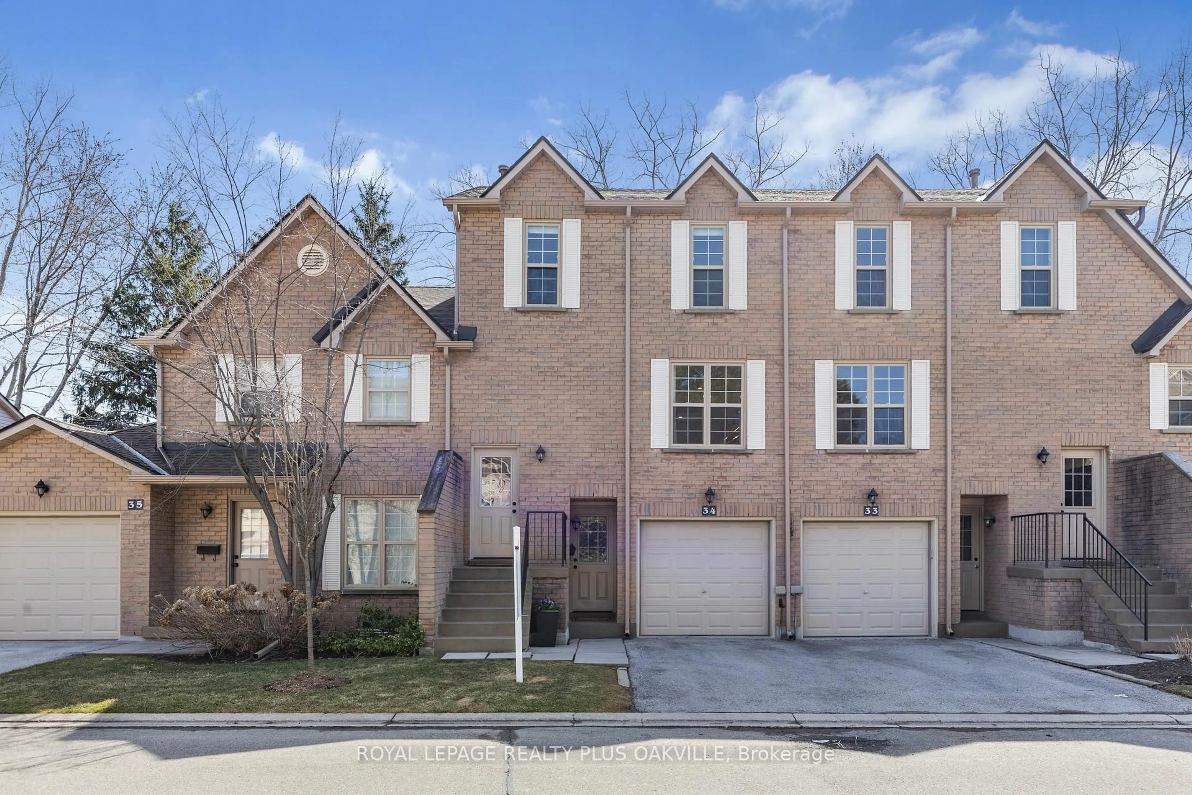 Home with brick exterior material, street for 2272 Mowat Ave #34, Oakville Ontario L6H 5L8
