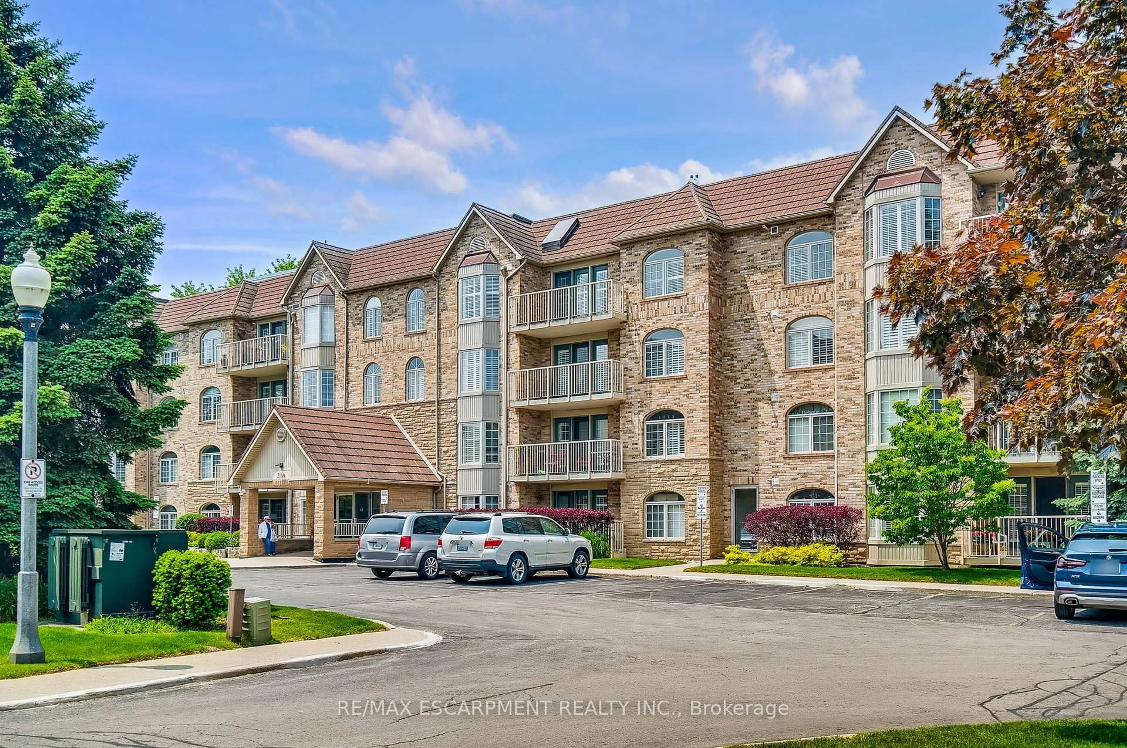 A pic from outside/outdoor area/front of a property/back of a property/a pic from drone, unknown for 216 Plains Rd #A405, Burlington Ontario L7T 2C3
