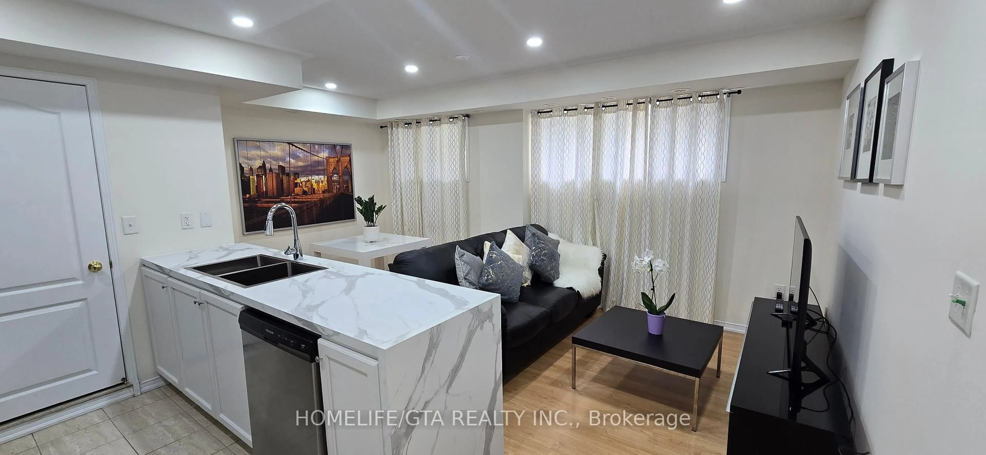 Living room with furniture, unknown for 157 Isaac Devins Blvd #3, Toronto Ontario M9M 0C5
