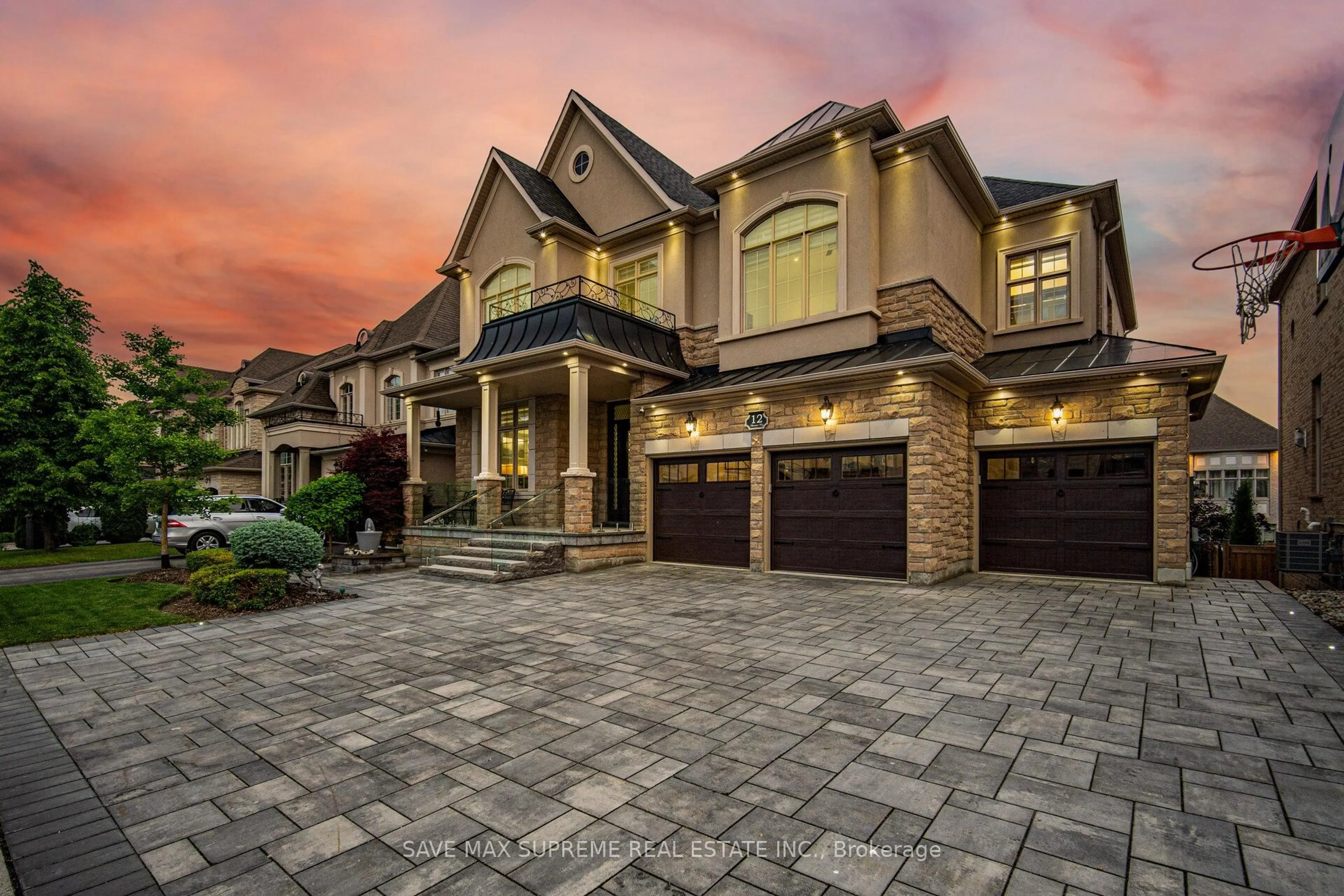 Home with brick exterior material, street for 12 Astrantia Way, Brampton Ontario L6X 1P3