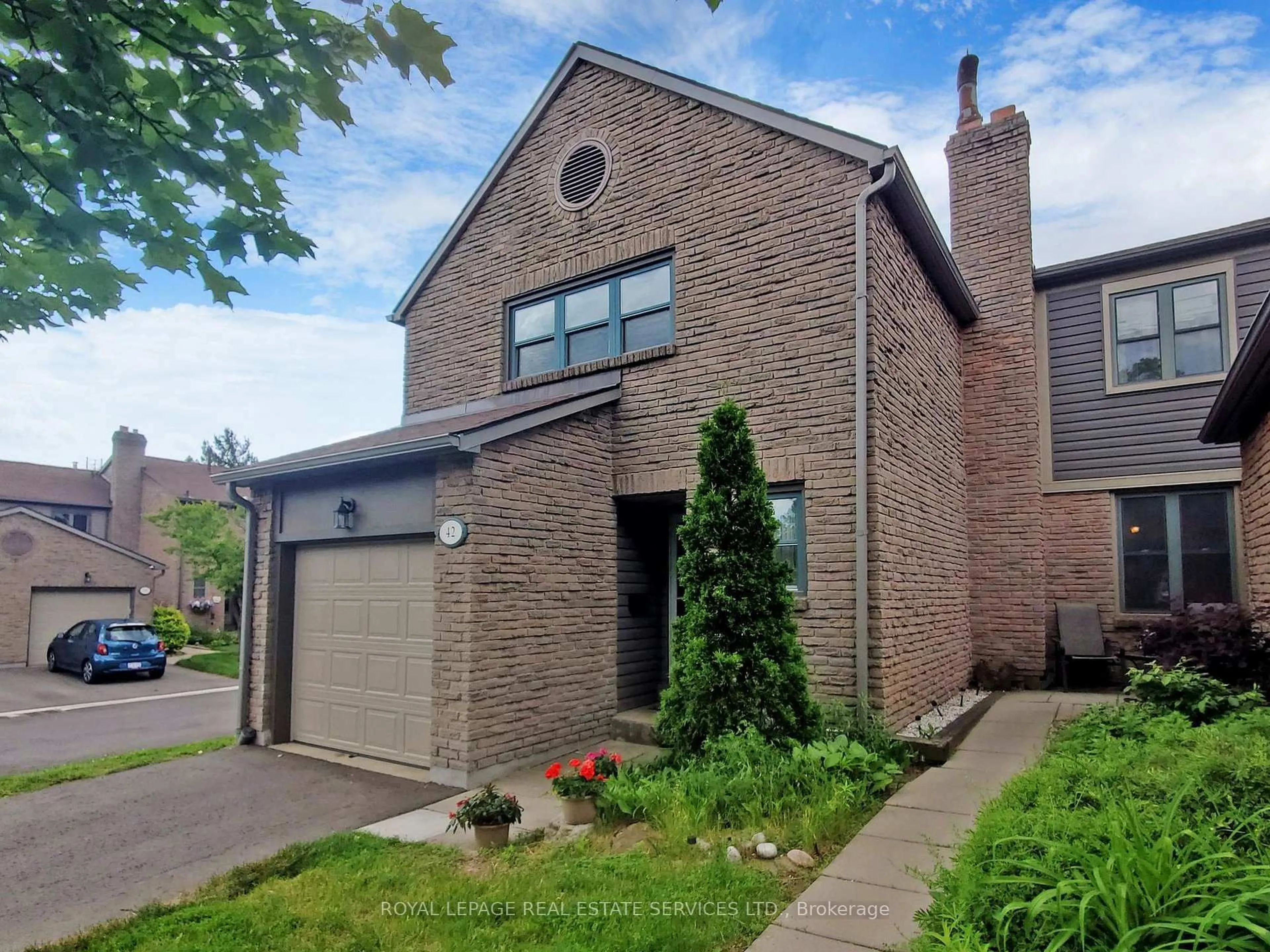 Home with brick exterior material, street for 4111 Arbour Green Dr #42, Mississauga Ontario L5L 2Z2