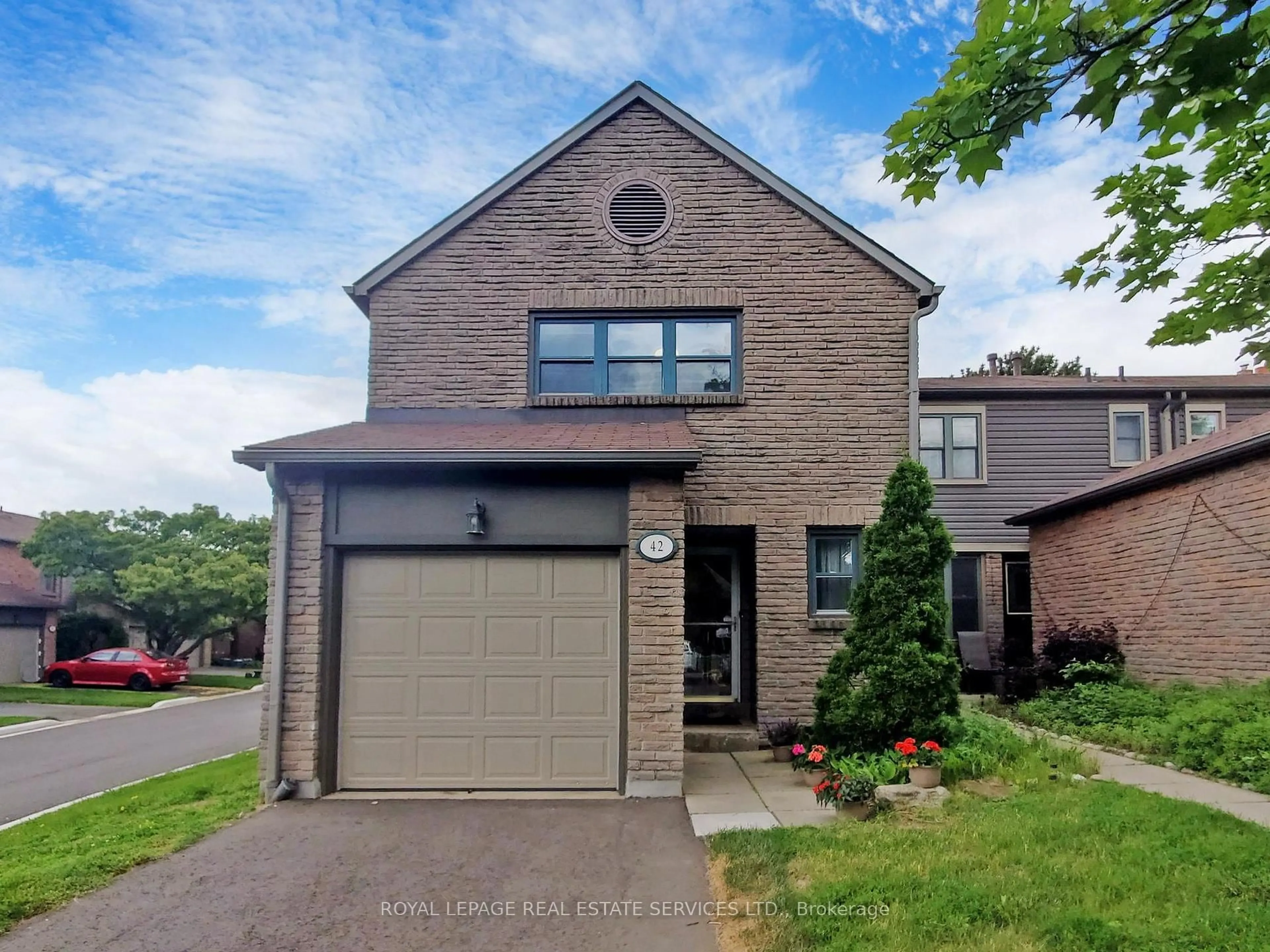 Home with brick exterior material, street for 4111 Arbour Green Dr #42, Mississauga Ontario L5L 2Z2