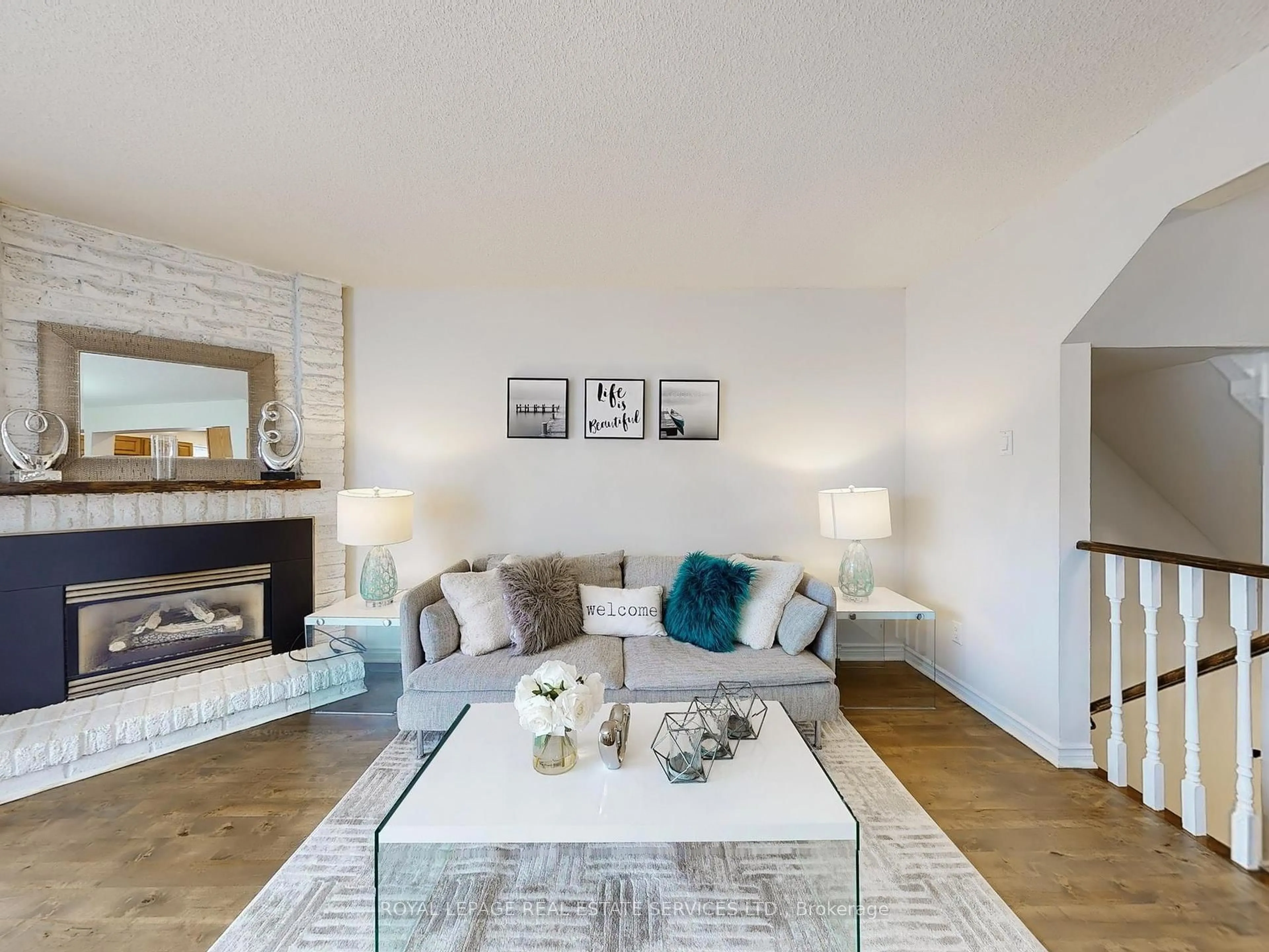 Living room with furniture, wood/laminate floor for 4111 Arbour Green Dr #42, Mississauga Ontario L5L 2Z2