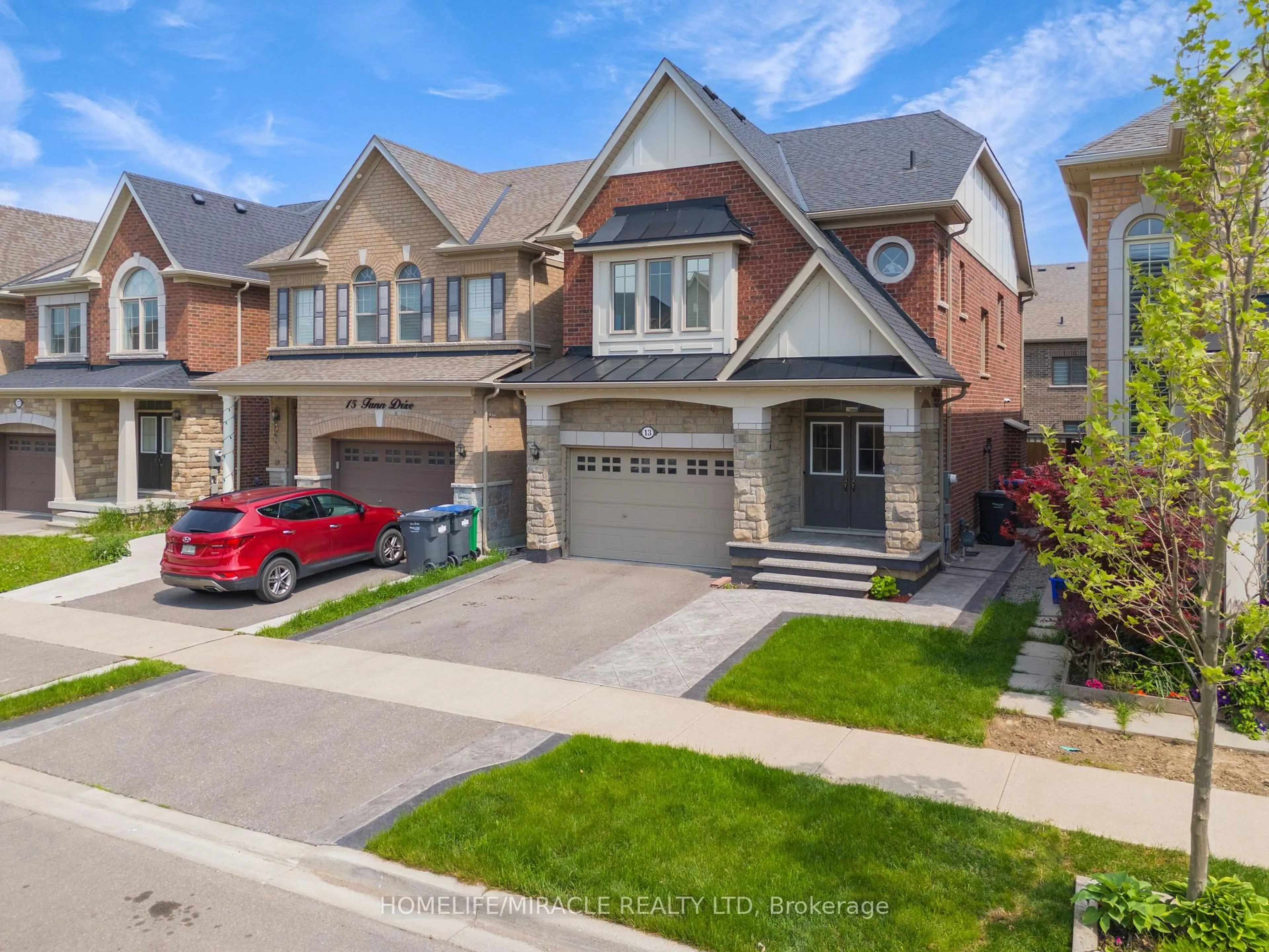 Home with brick exterior material, street for 13 Fann Dr, Brampton Ontario L7A 4L4