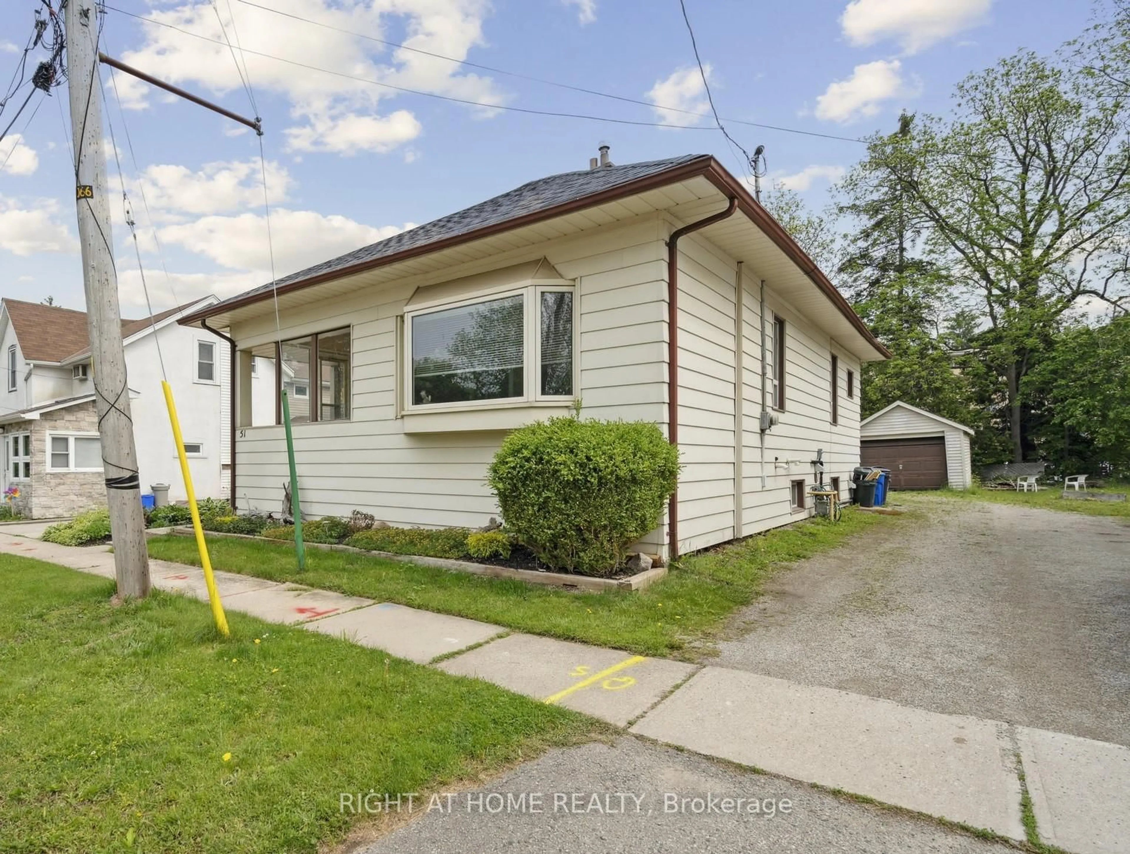Home with vinyl exterior material, street for 51 Frederick St, Halton Hills Ontario L7J 2B9