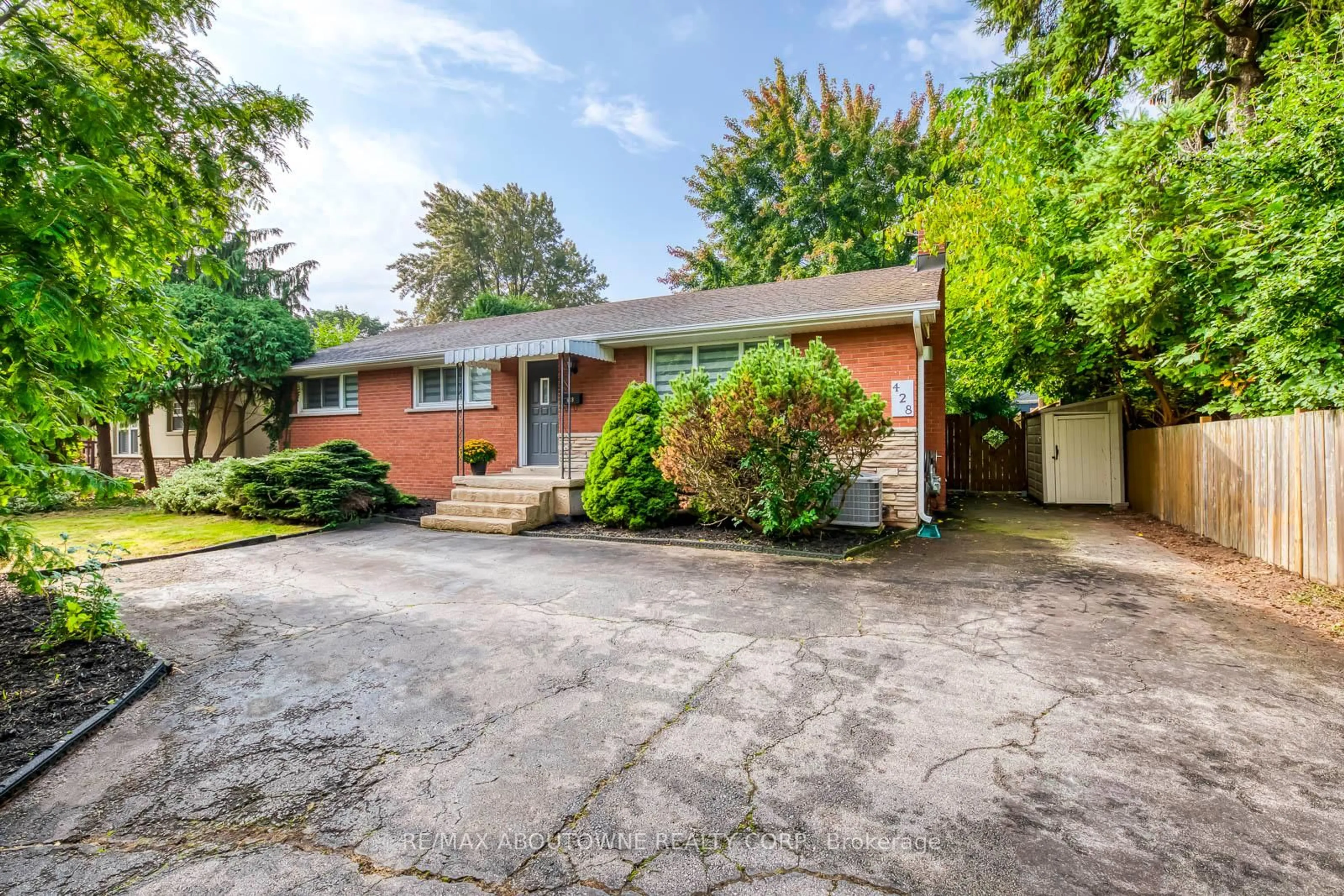 Home with brick exterior material, street for 428 Henderson Rd, Burlington Ontario L7L 2P8