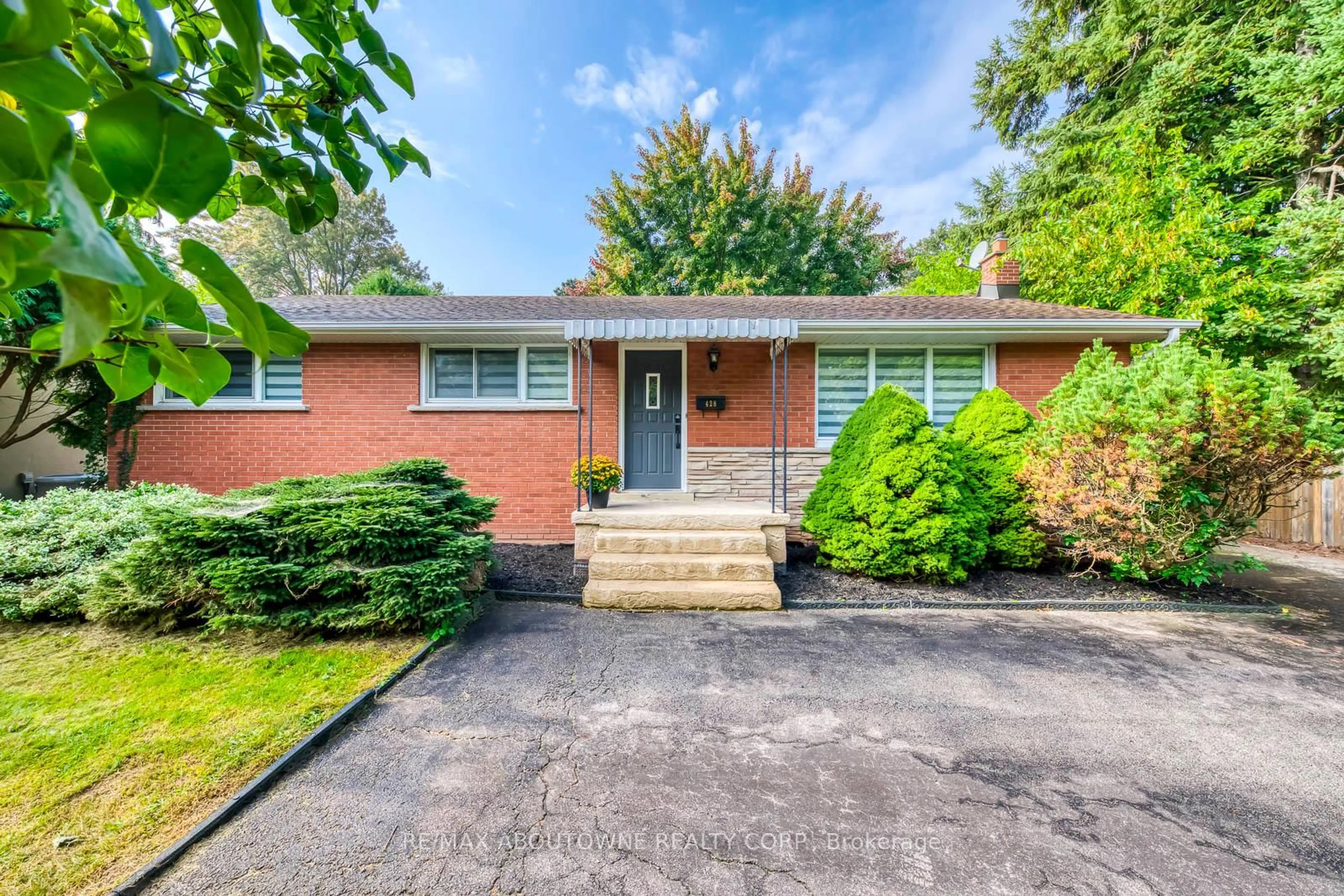Home with brick exterior material, street for 428 Henderson Rd, Burlington Ontario L7L 2P8