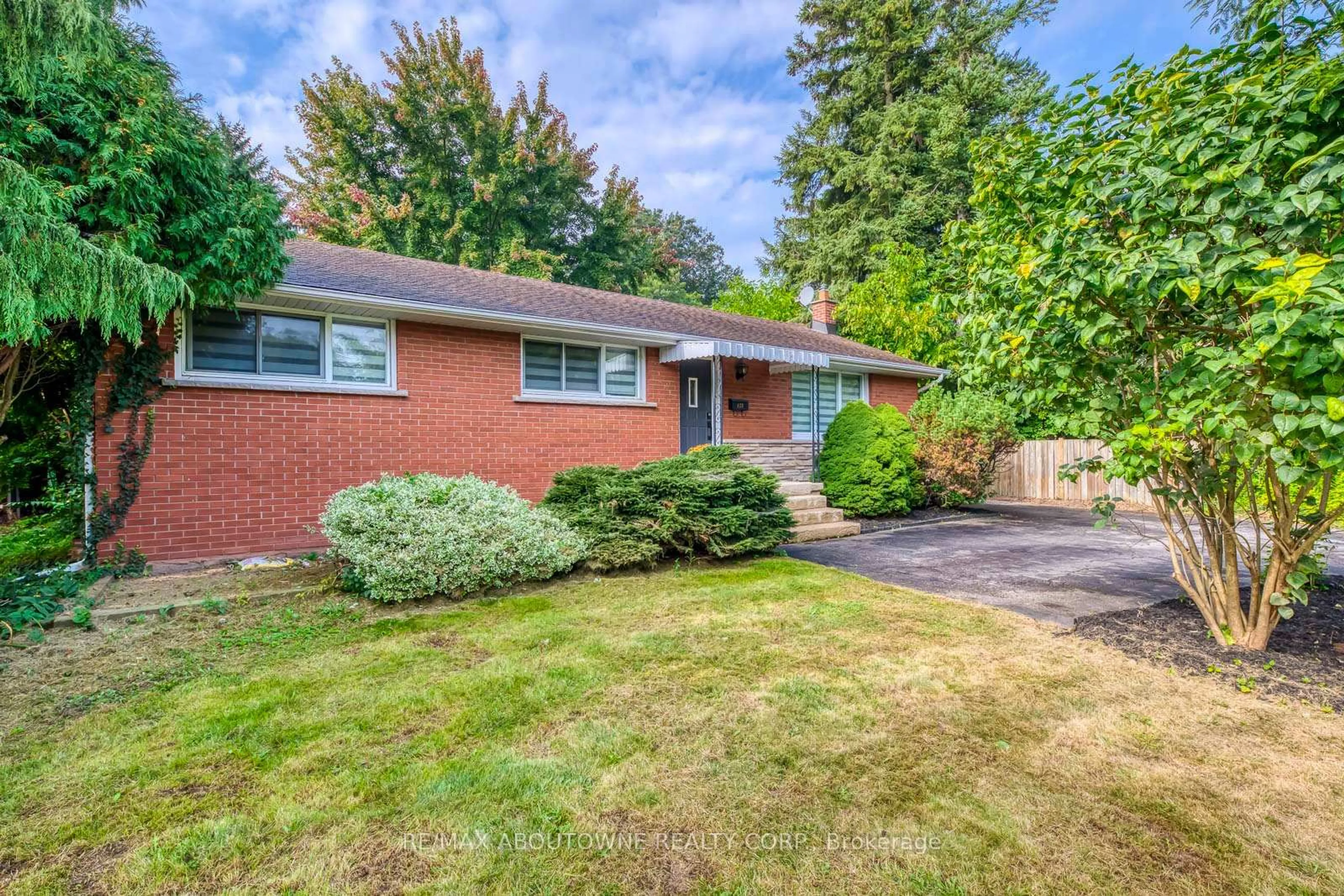 Home with brick exterior material, street for 428 Henderson Rd, Burlington Ontario L7L 2P8