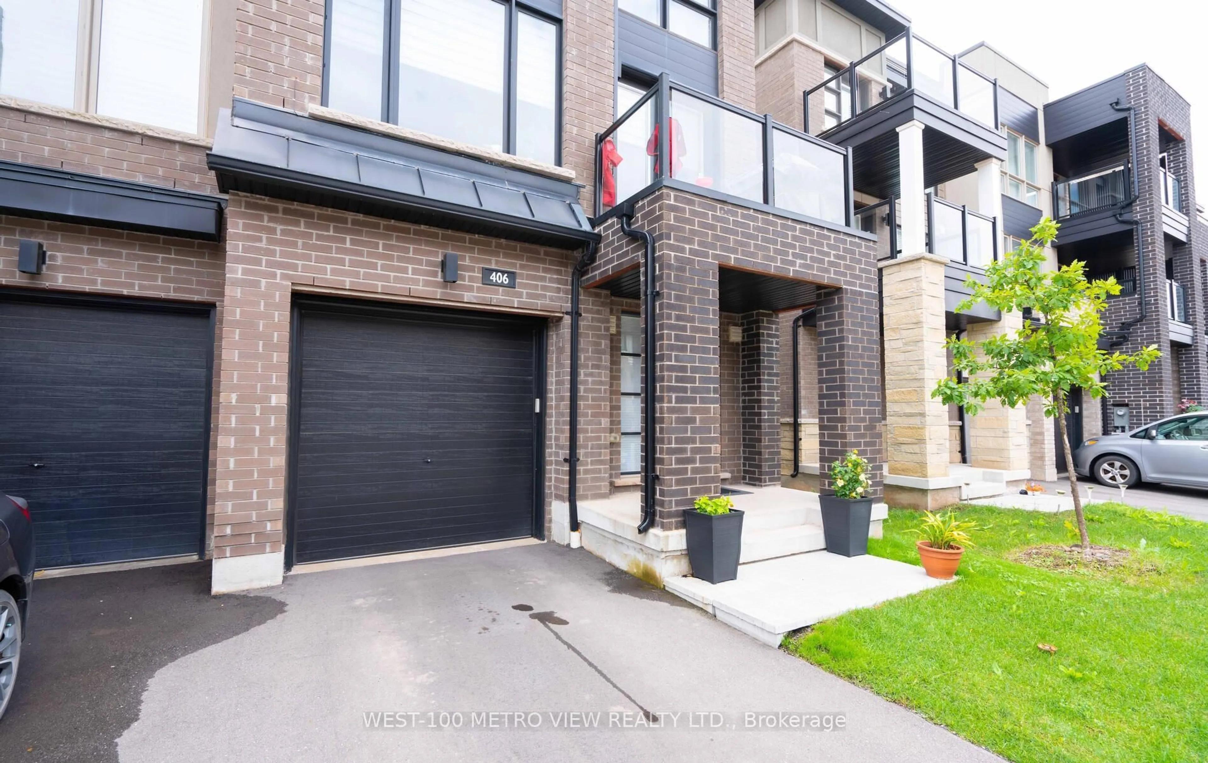 Home with brick exterior material, street for 406 Athabasca Common, Oakville Ontario L6H 0R5