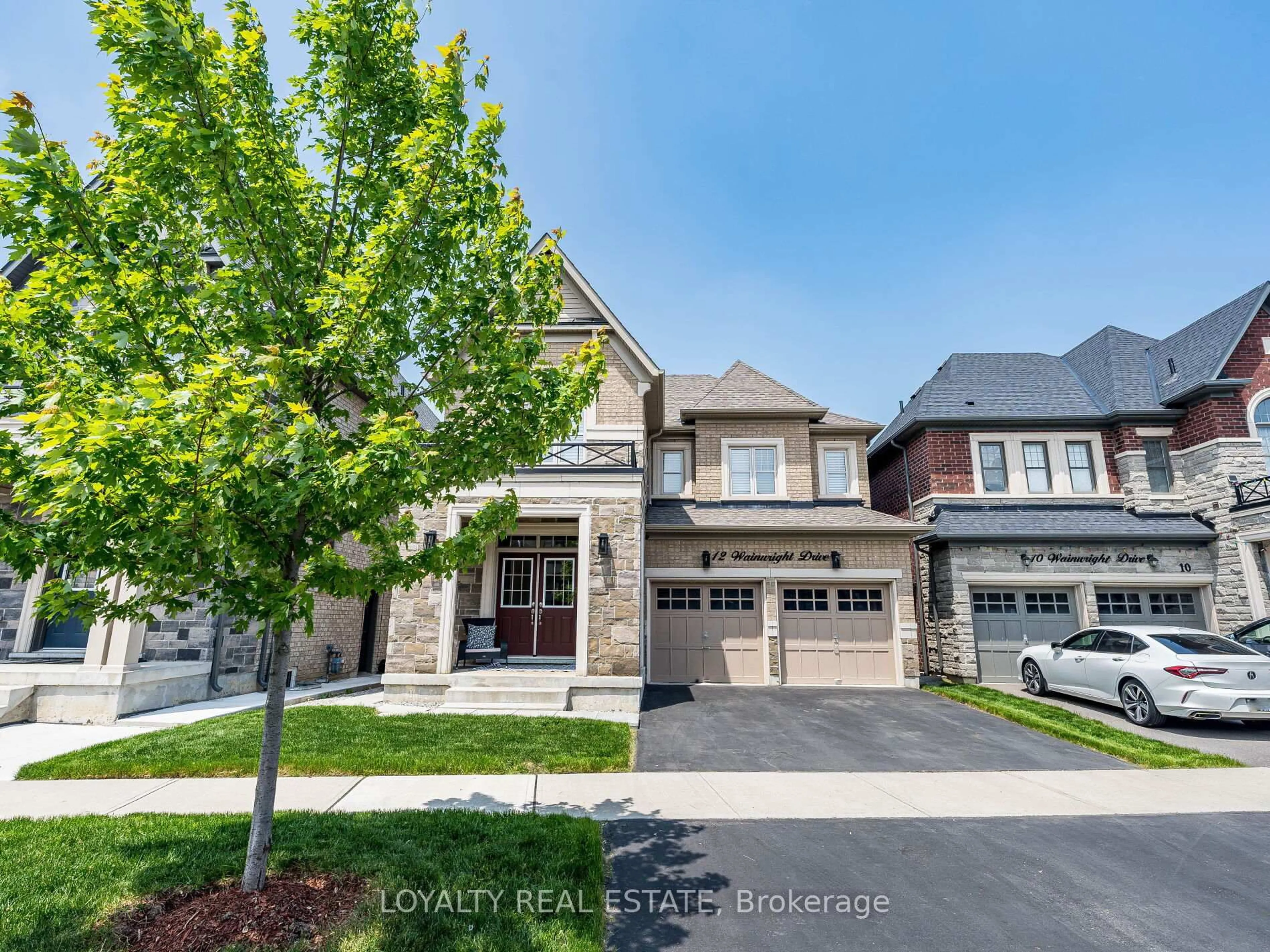 Home with brick exterior material, street for 12 Wainwright Dr, Brampton Ontario L7A 4Y6
