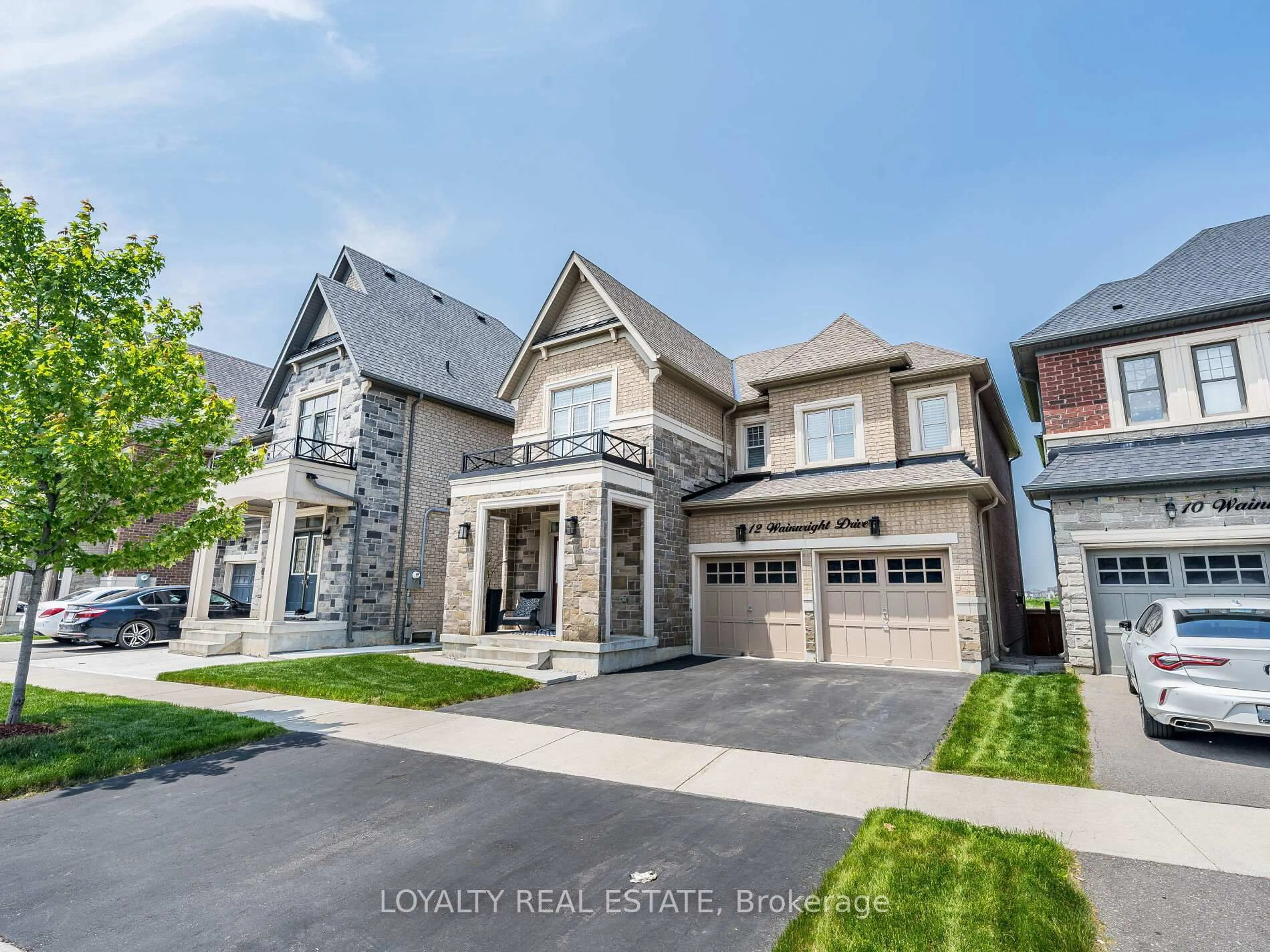 Home with brick exterior material, street for 12 Wainwright Dr, Brampton Ontario L7A 4Y6
