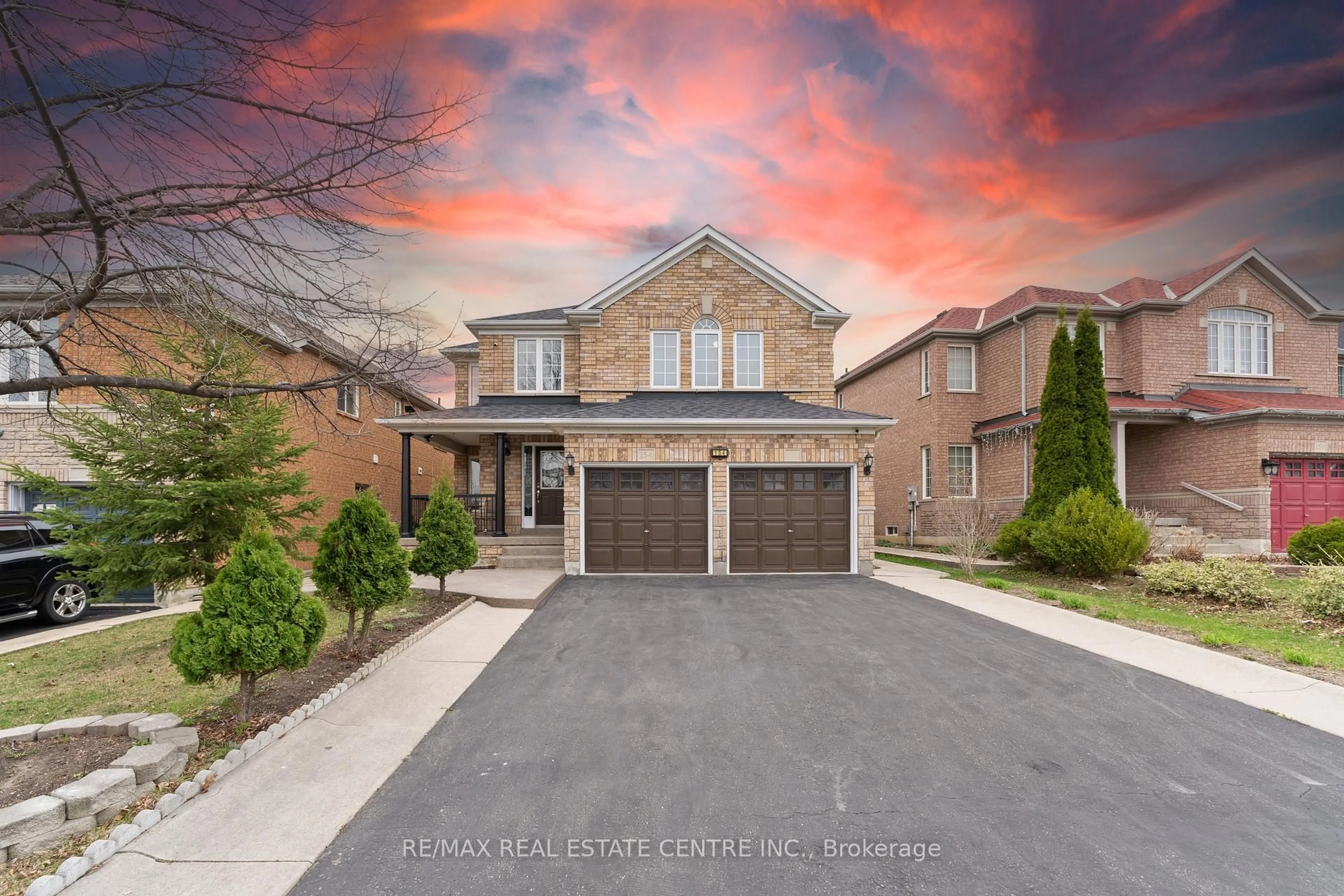 Home with brick exterior material, street for 154 Sunny Meadow Blvd, Brampton Ontario L6R 2Z2