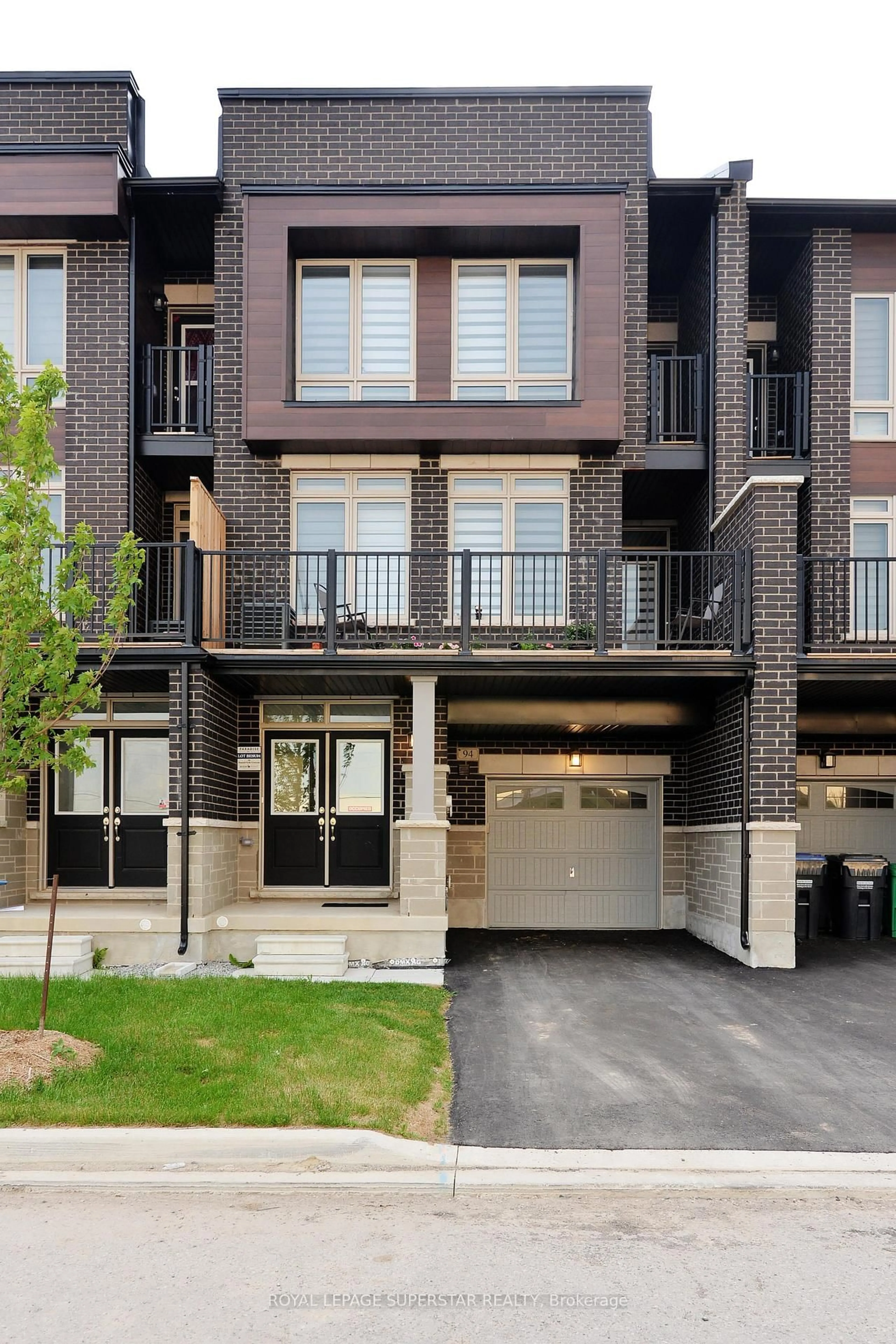 Home with brick exterior material, street for 94 Donald Ficht Cres, Brampton Ontario L7A 5H8