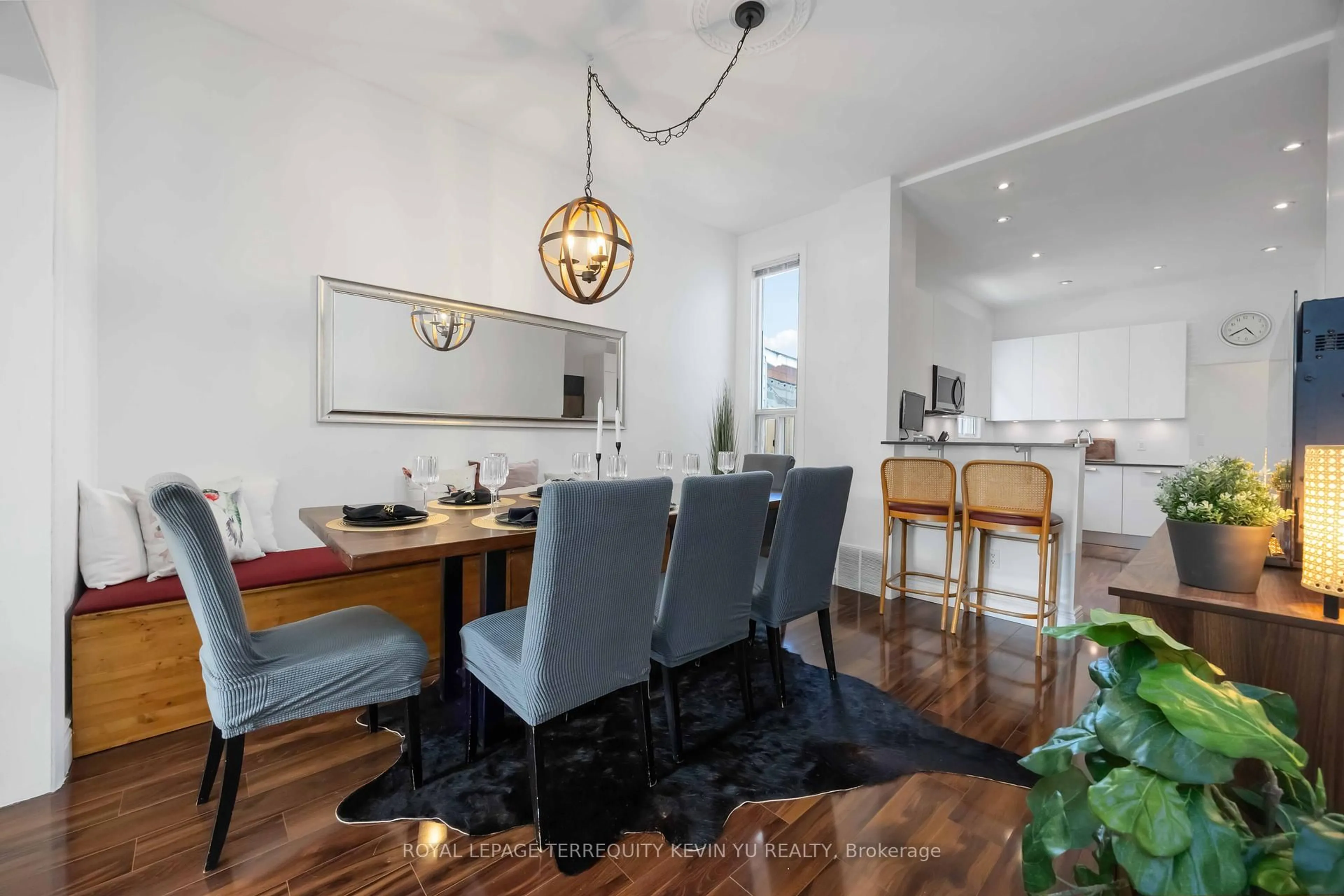 Dining room, wood/laminate floor for 23 Edwin Ave, Toronto Ontario M6P 3Z5