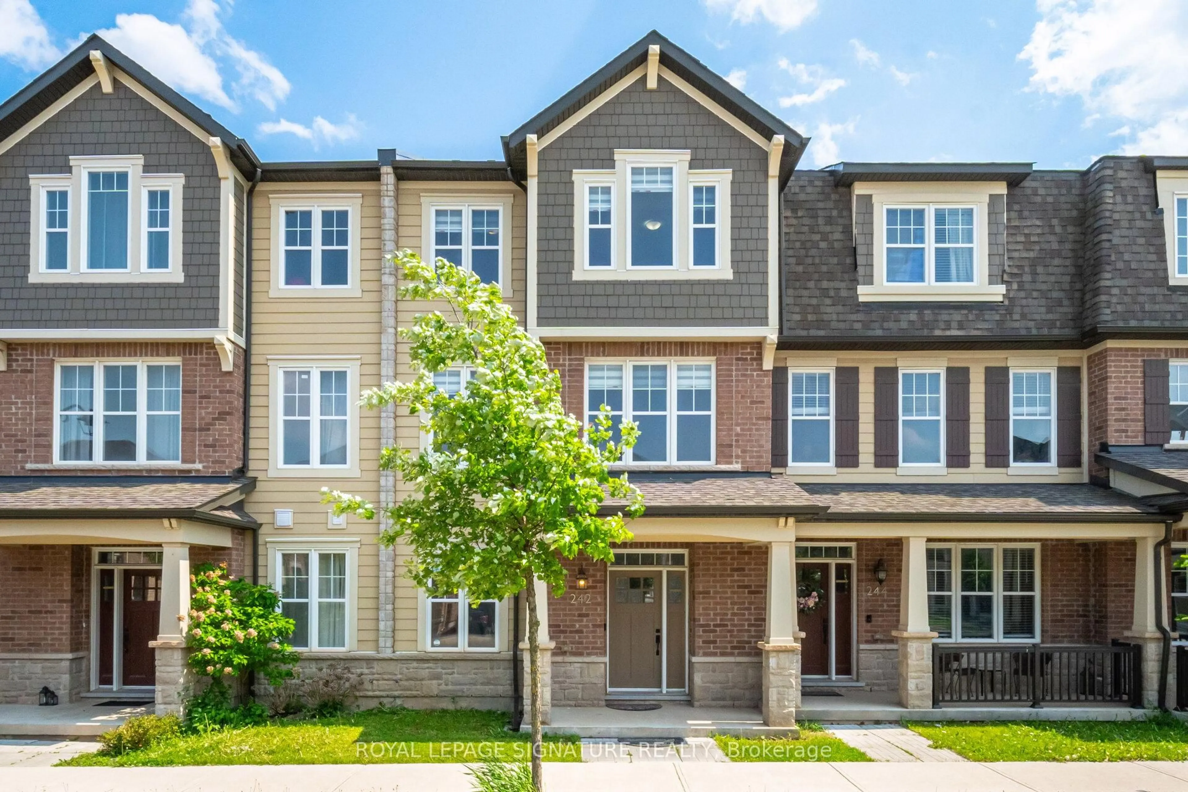 Home with brick exterior material, street for 242 Harold Dent Tr, Oakville Ontario L6M 1S2