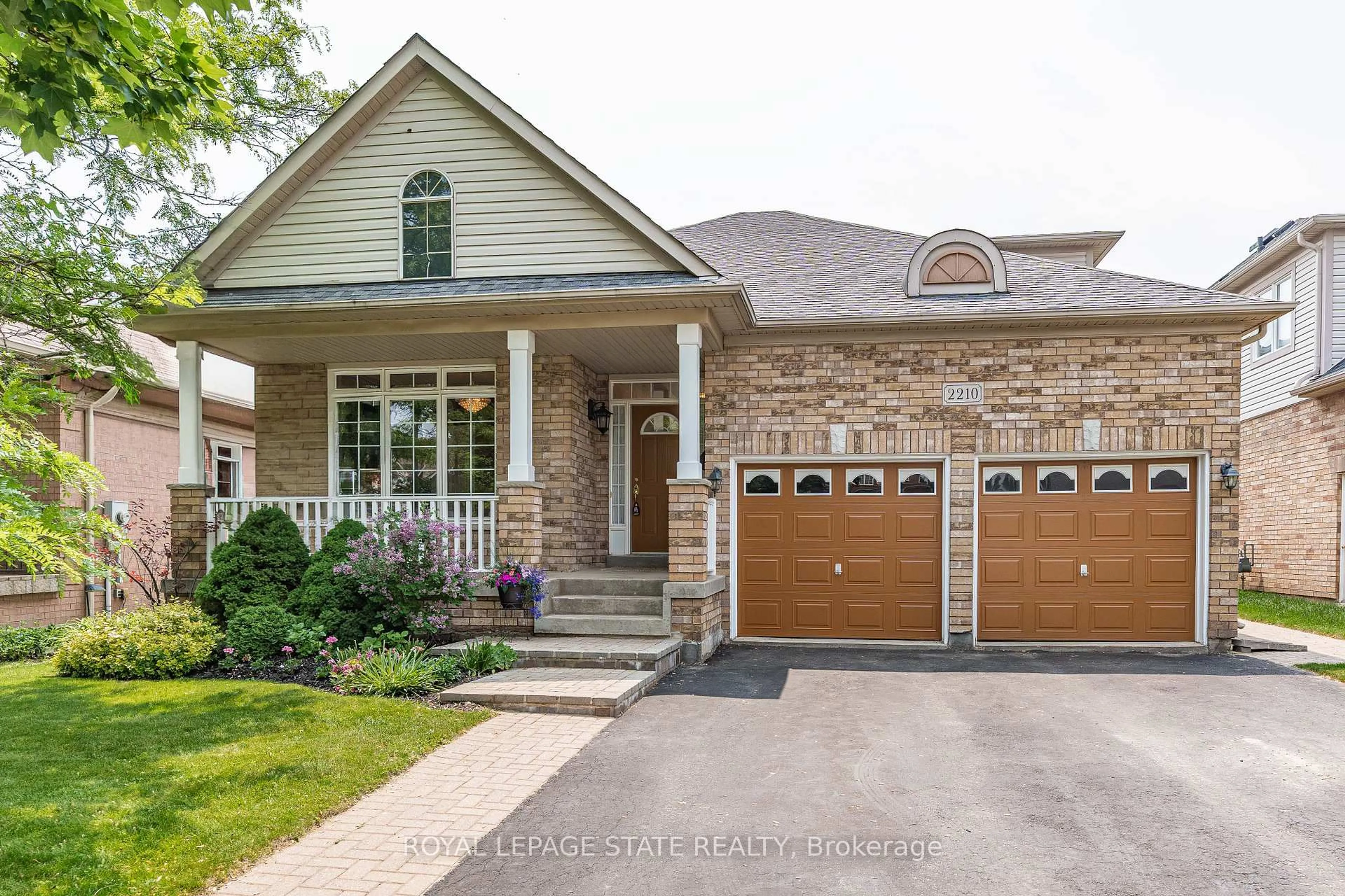 Home with brick exterior material, street for 2210 Tiger Rd, Burlington Ontario L7M 4W9