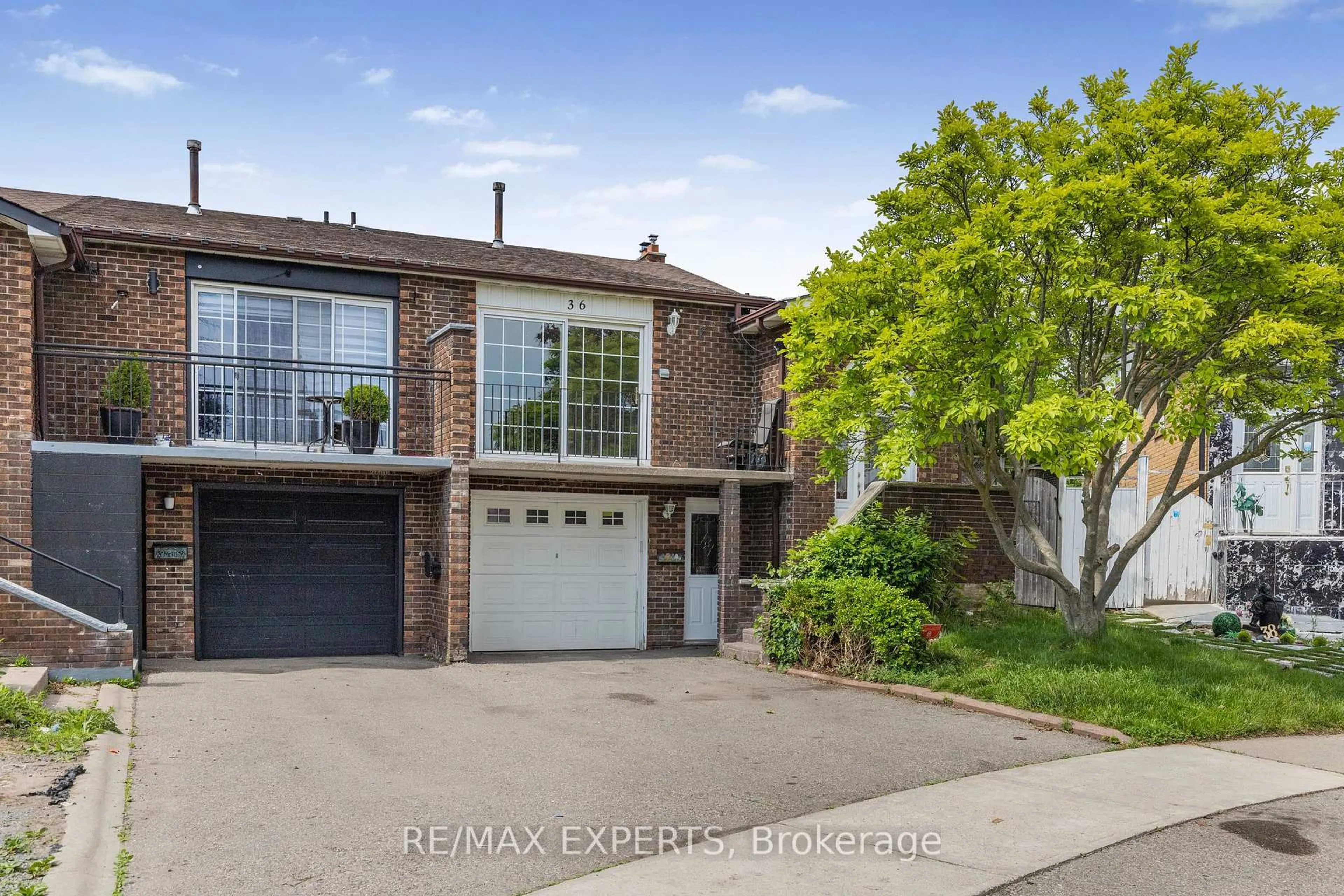 Home with brick exterior material, street for 36 Elderwood Pl, Brampton Ontario L6V 3N3