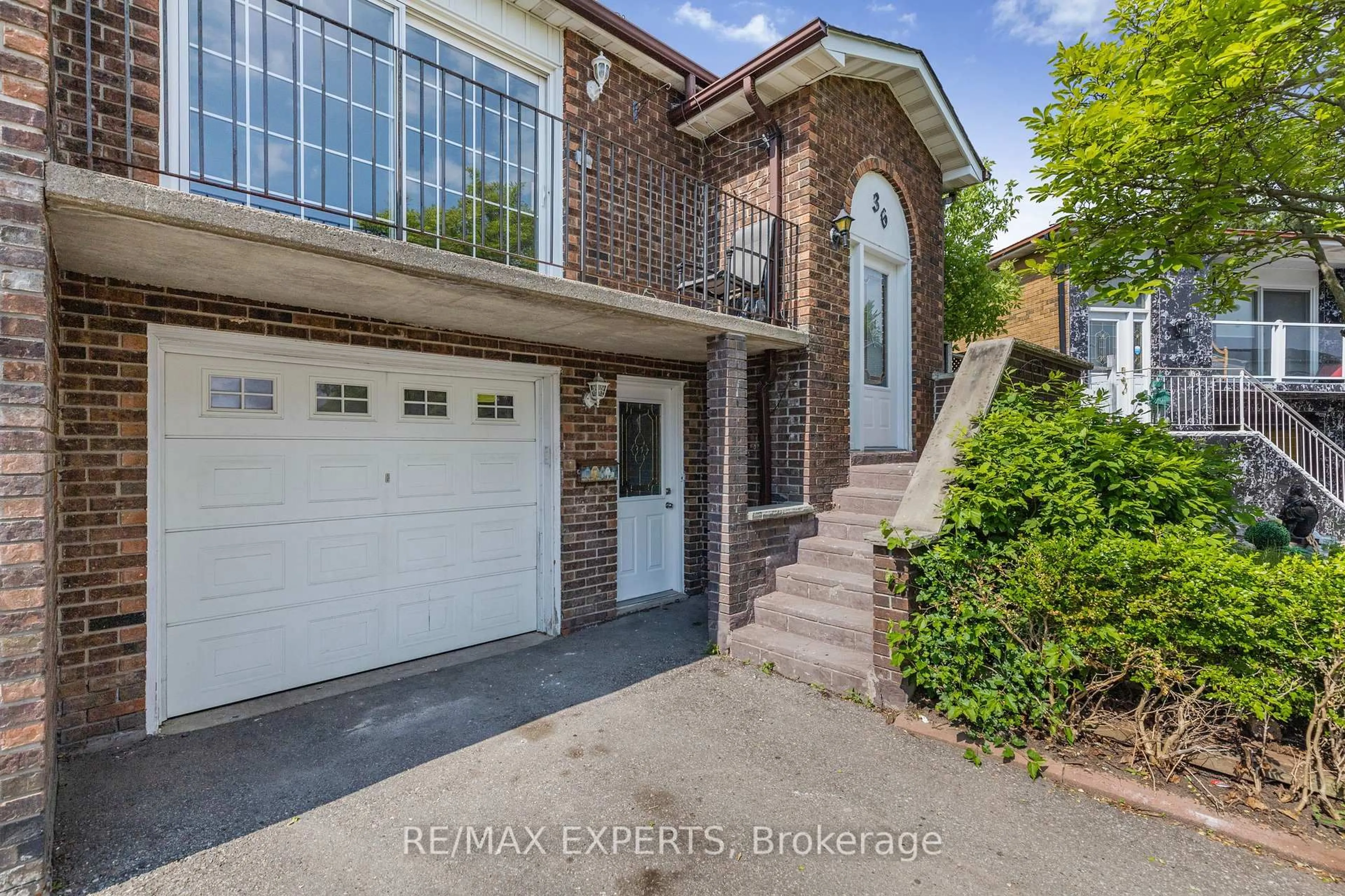Home with brick exterior material, street for 36 Elderwood Pl, Brampton Ontario L6V 3N3