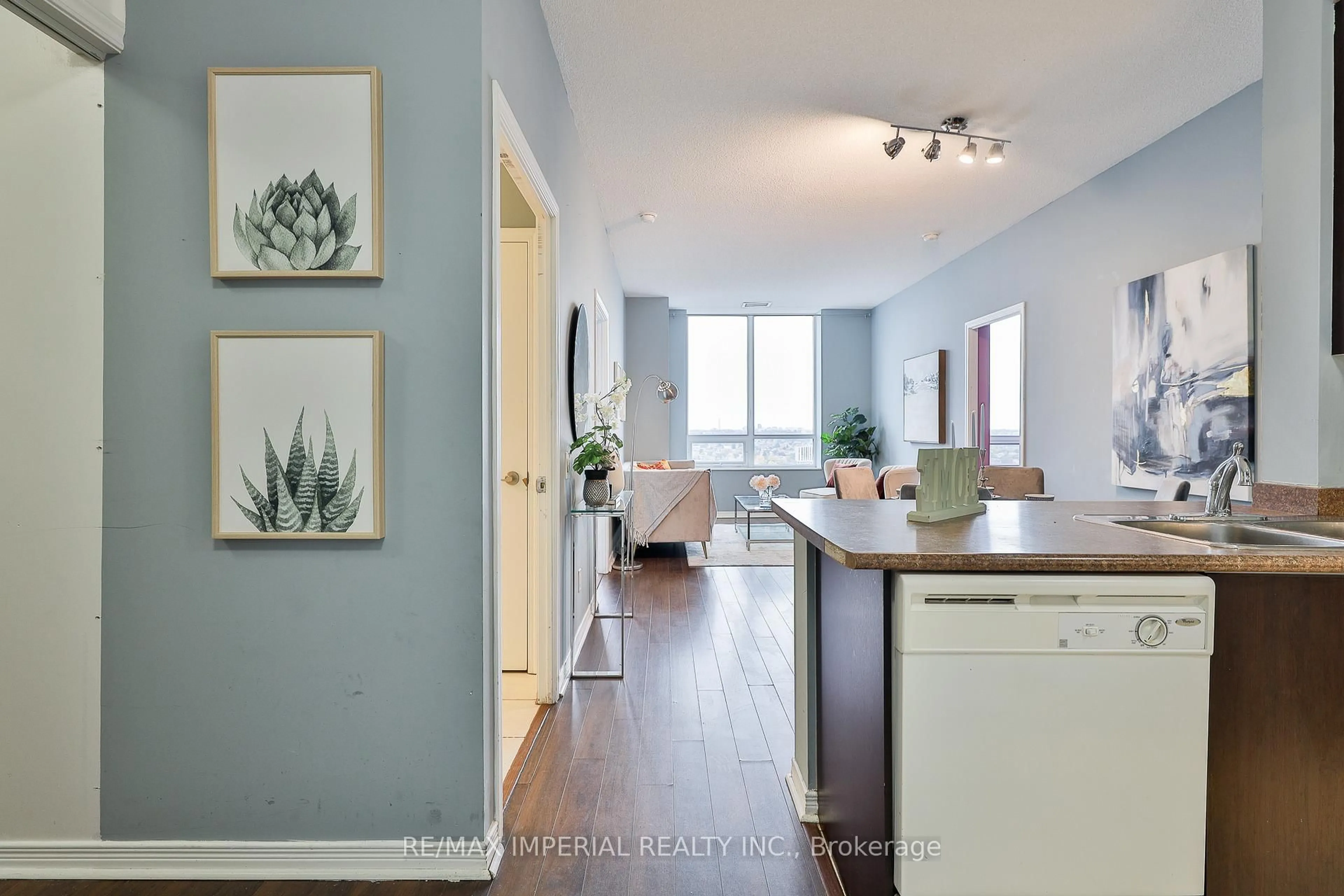Open concept kitchen, wood/laminate floor for 60 Heintzman St #2403, Toronto Ontario M6P 5A1
