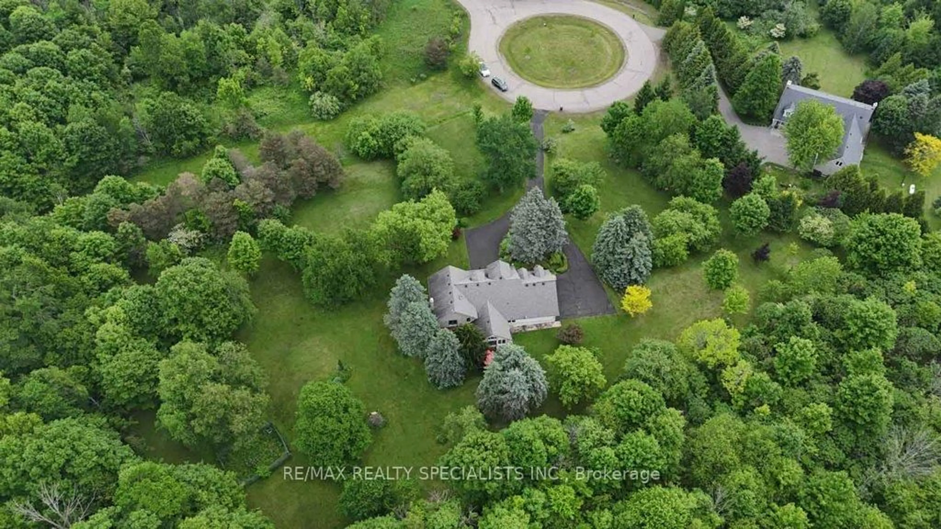A pic from outside/outdoor area/front of a property/back of a property/a pic from drone, forest/trees view for 16 McCartney Dr, Caledon Ontario L7C 0B6