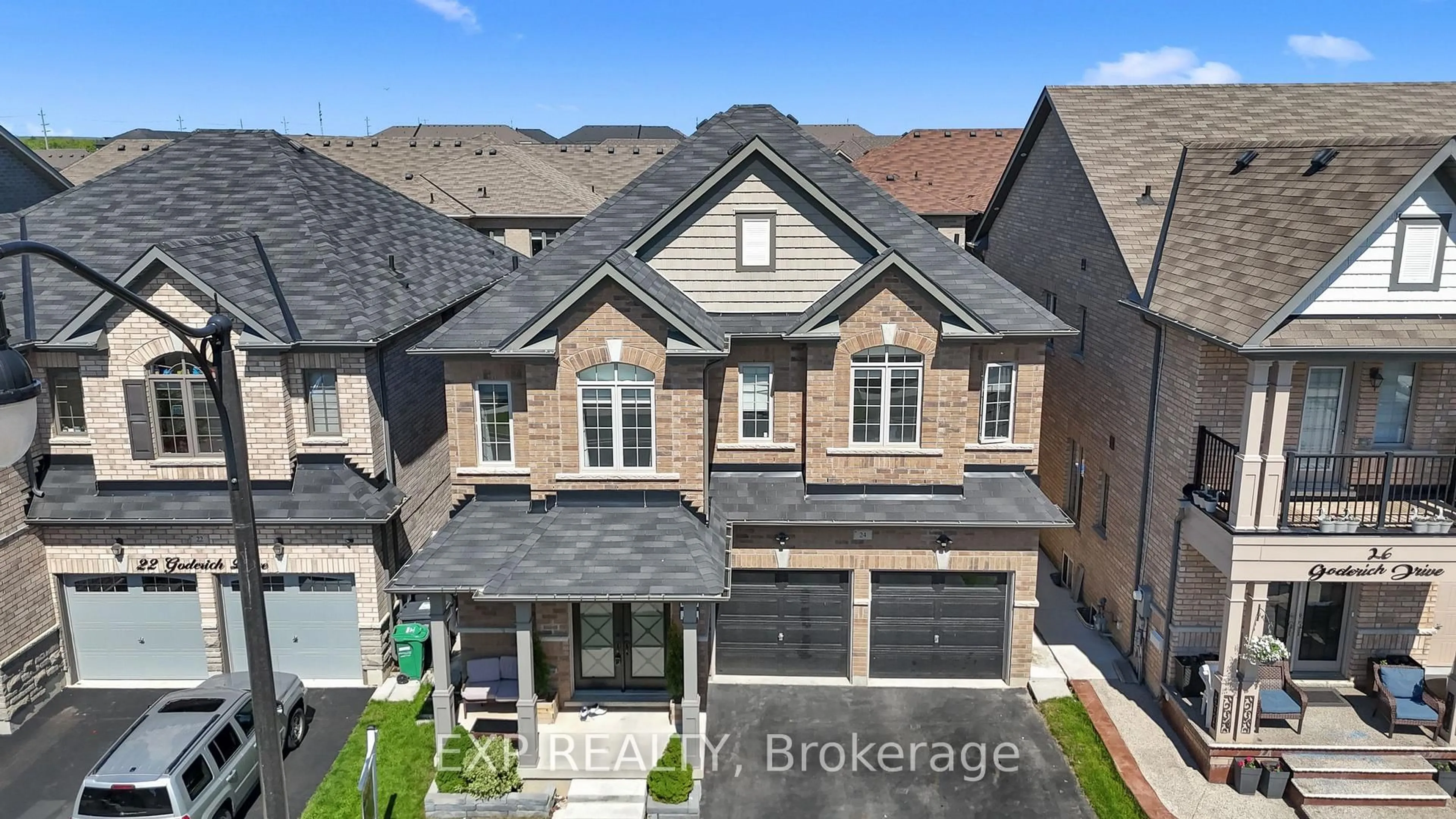A pic from outside/outdoor area/front of a property/back of a property/a pic from drone, street for 24 Goderich Dr, Brampton Ontario L7A 5A7