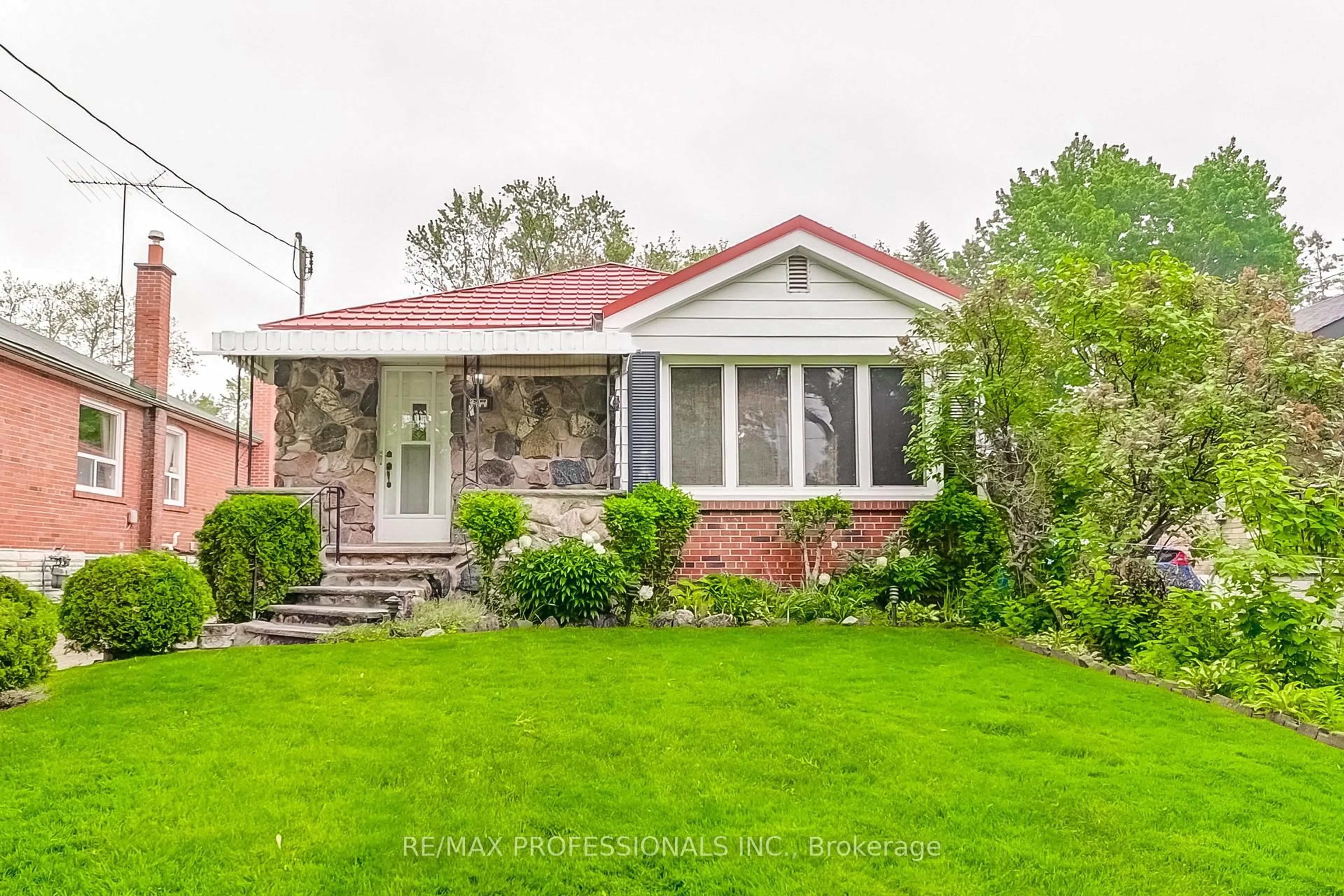 Home with brick exterior material, street for 27 Northampton Dr, Toronto Ontario M9B 4S5