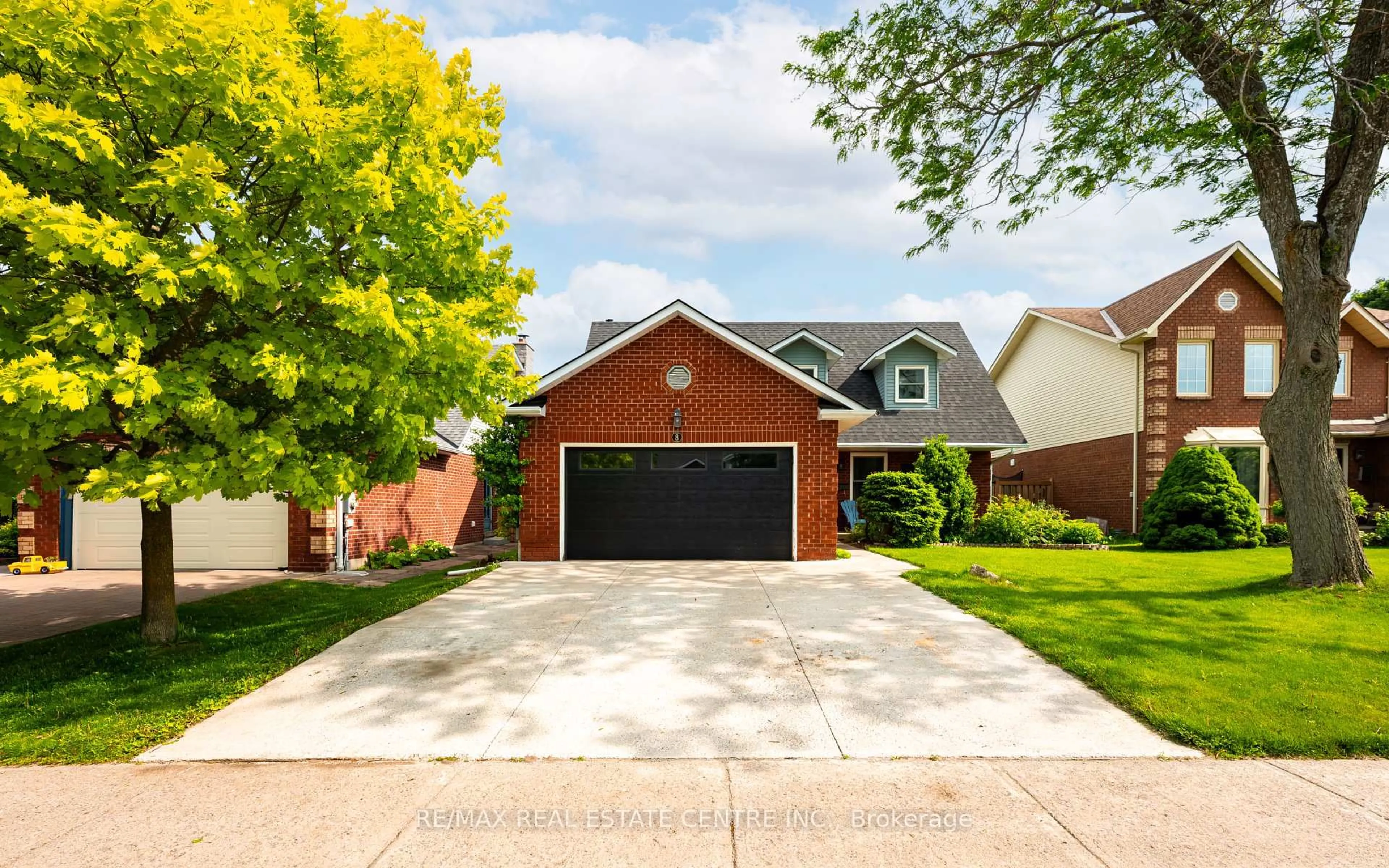 Home with brick exterior material, street for 8 Passmore Ave, Orangeville Ontario L9W 4E2