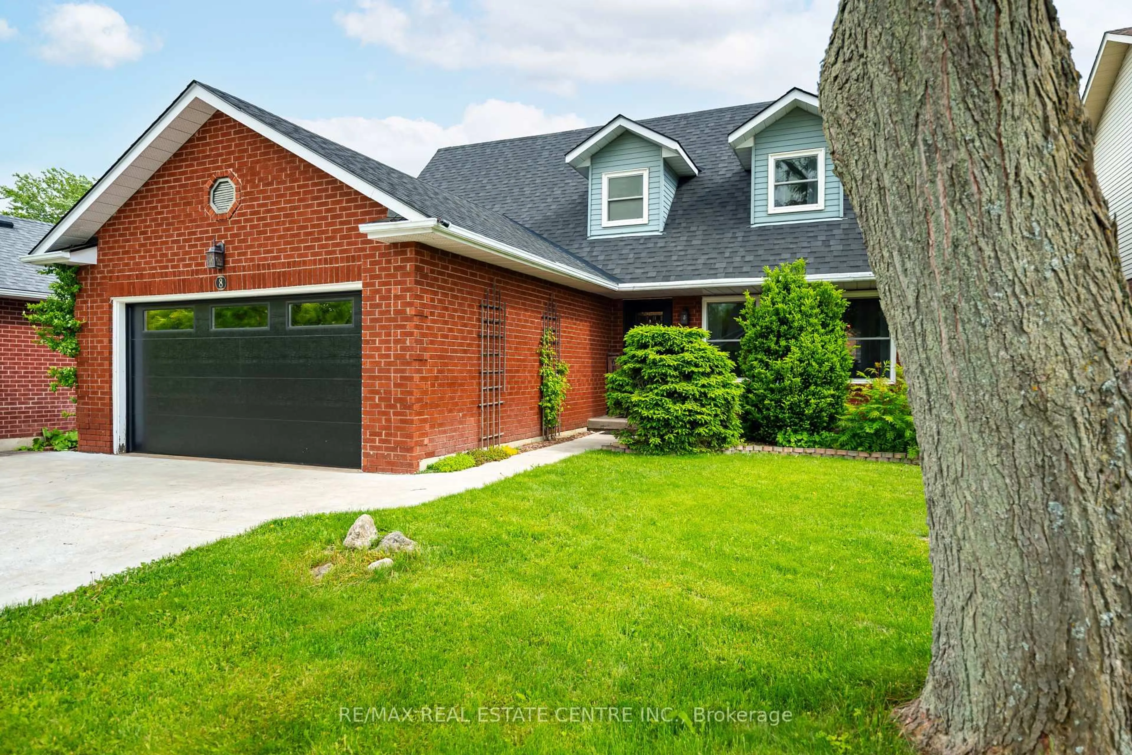 Home with brick exterior material, street for 8 Passmore Ave, Orangeville Ontario L9W 4E2