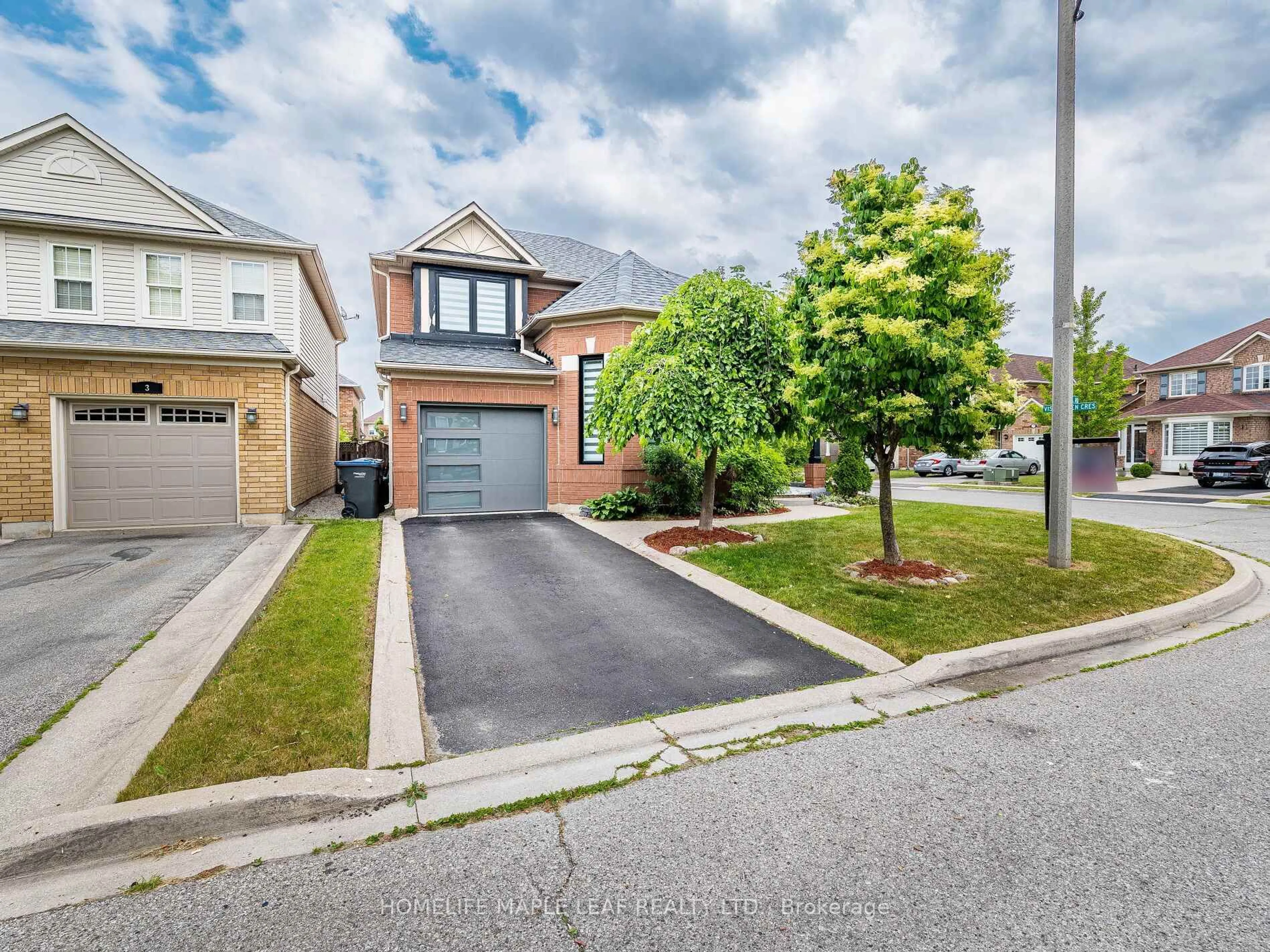 Home with brick exterior material, street for 27 Vista Green Cres, Brampton Ontario L7A 2S4