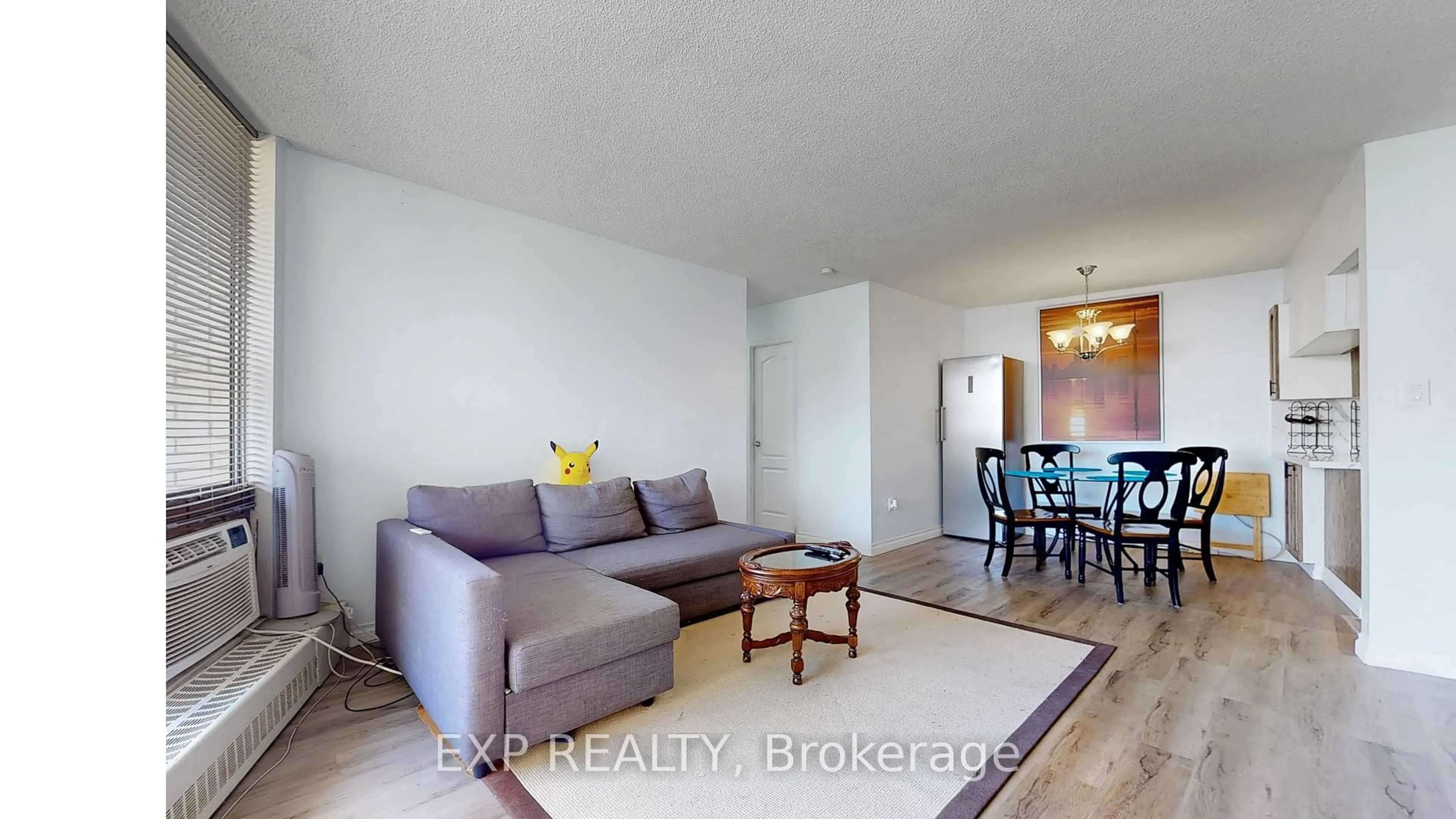 Living room with furniture, unknown for 330 Dixon Rd #1007, Toronto Ontario M9R 1S9