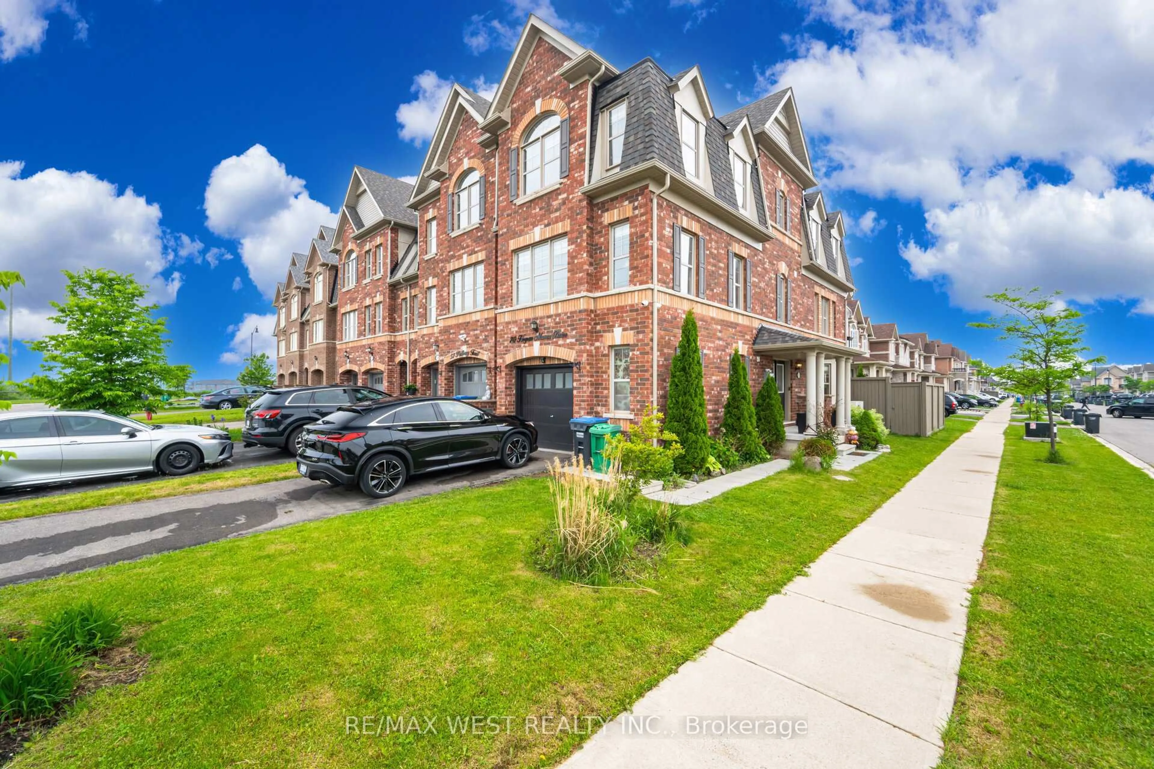 A pic from outside/outdoor area/front of a property/back of a property/a pic from drone, street for 70 Hogan Manor Dr, Brampton Ontario L7A 4V3