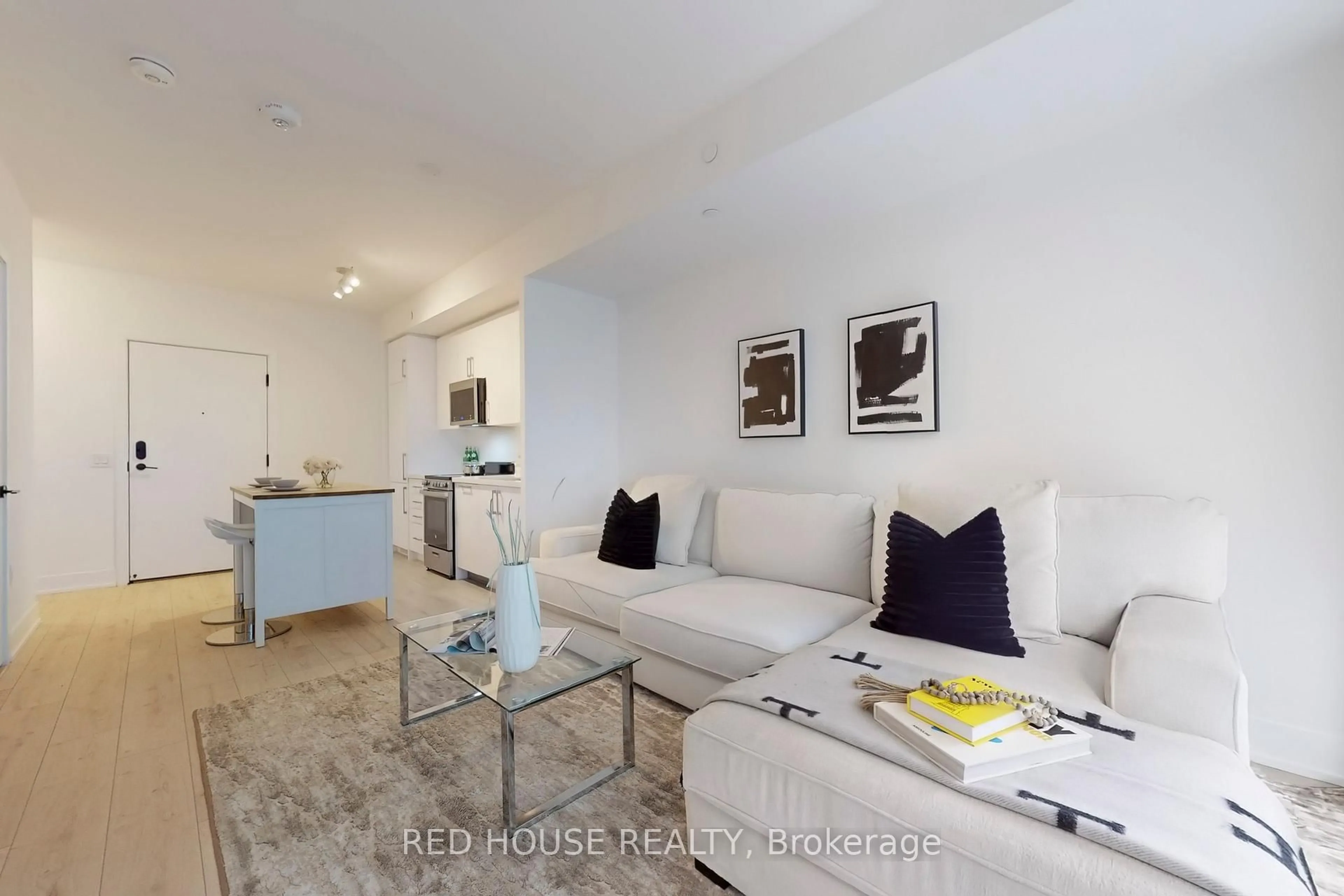 Living room with furniture, unknown for 2450 Old Bronte Rd #219, Oakville Ontario L6M 5P6