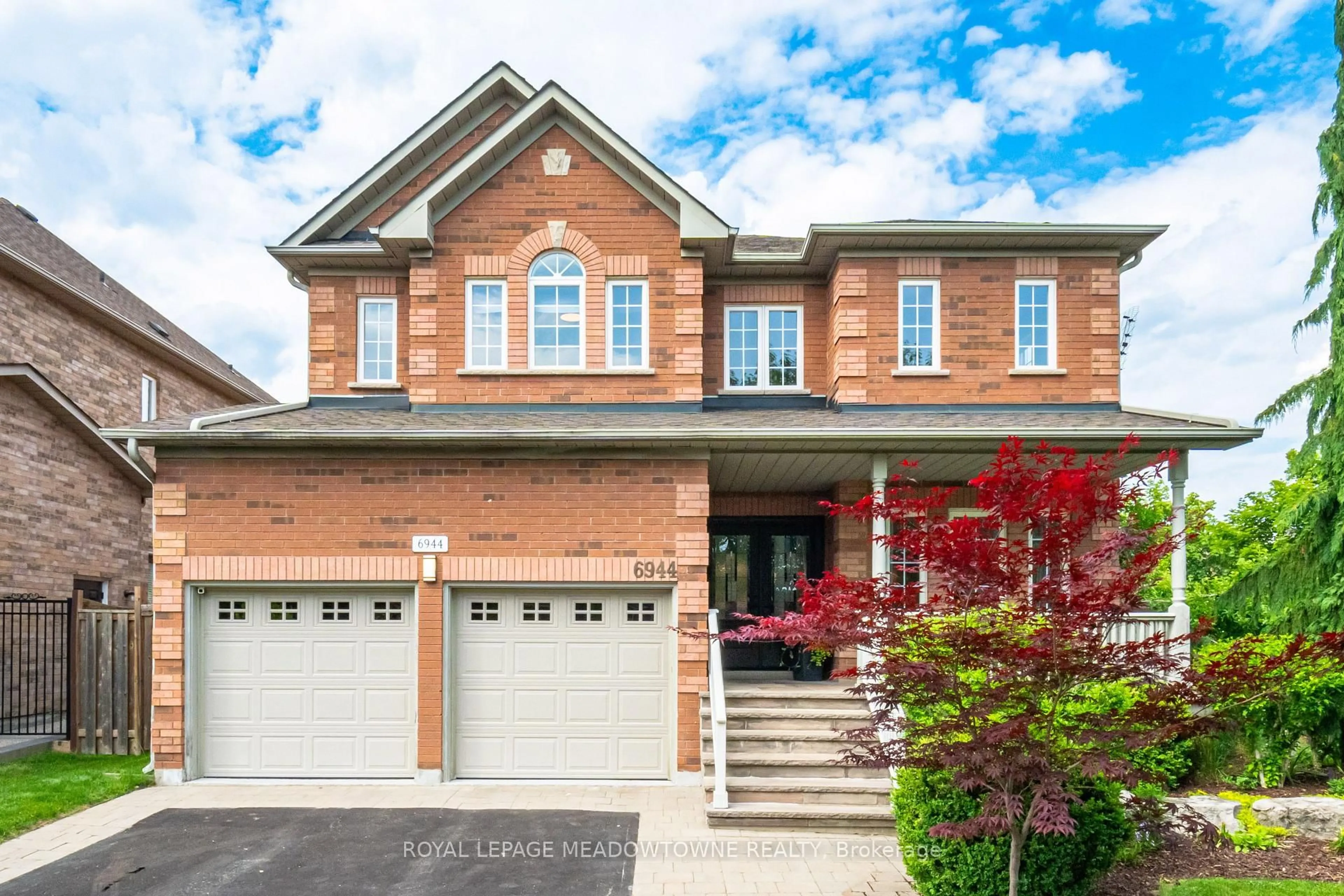 Home with brick exterior material, street for 6944 Johnson Wagon Cres, Mississauga Ontario L5W 1B2