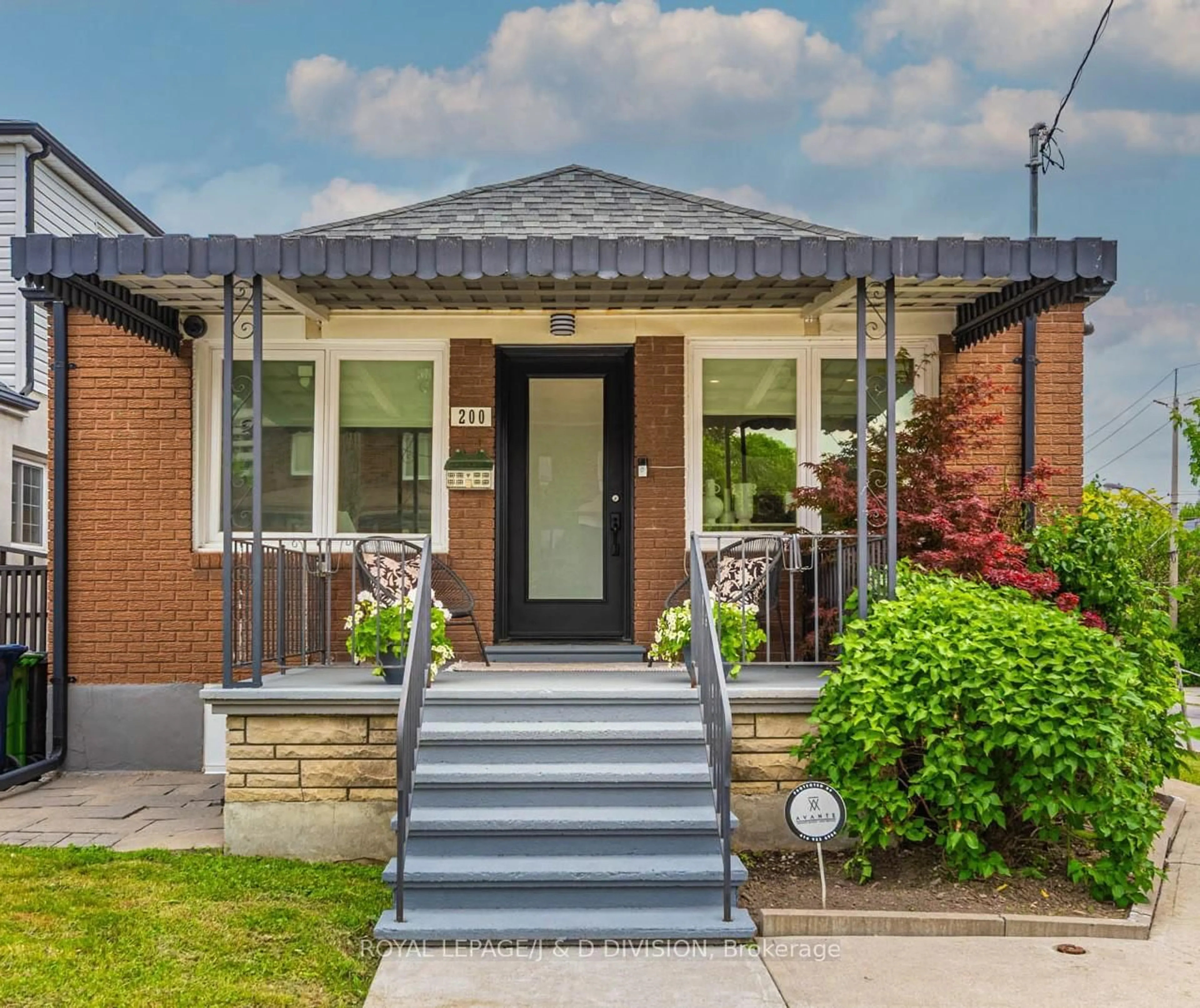 Home with brick exterior material, street for 200 Belgravia Ave, Toronto Ontario M6E 2M8