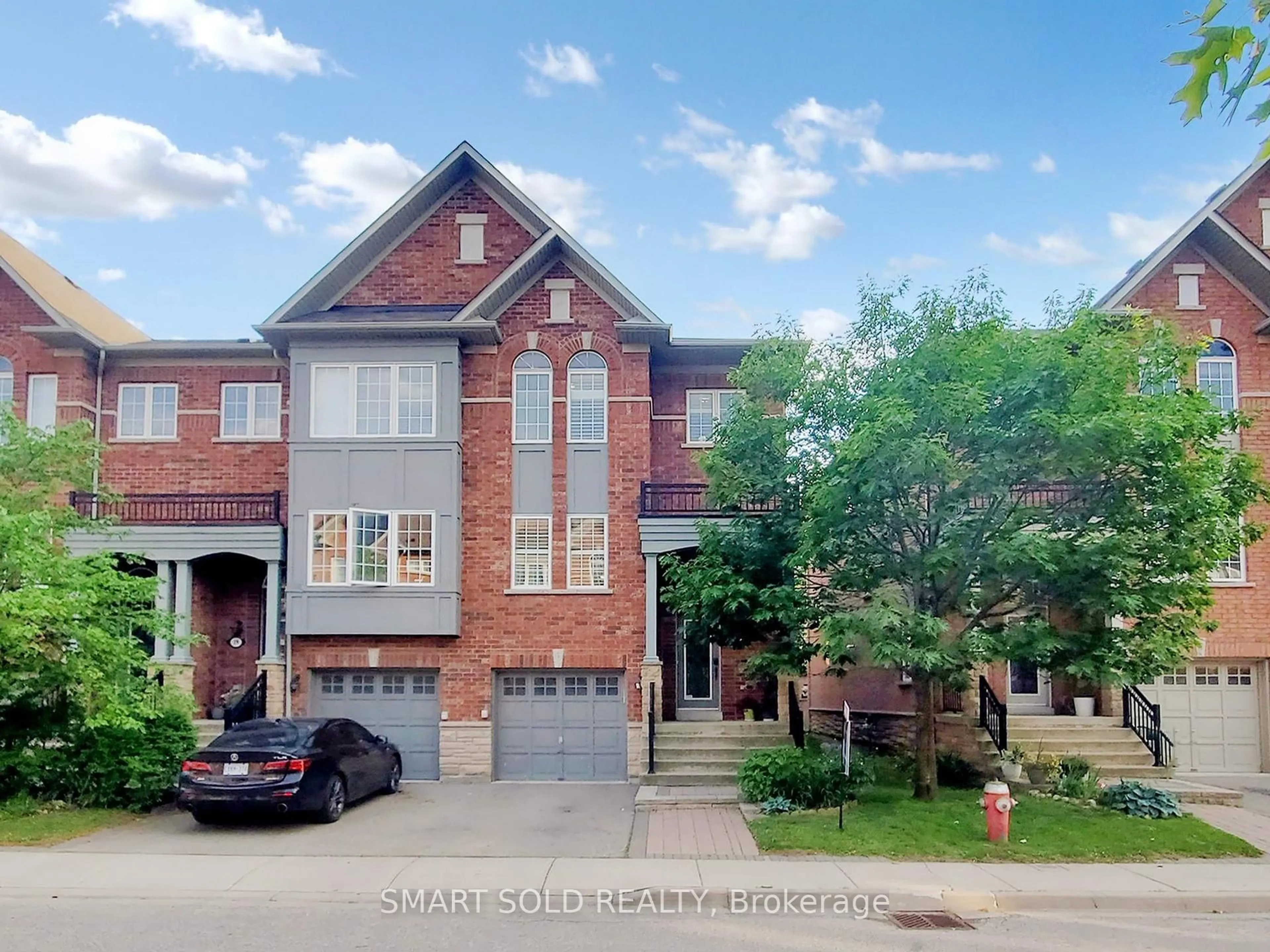 Home with brick exterior material, street for 230 Paisley Blvd #26, Mississauga Ontario L5B 0C5