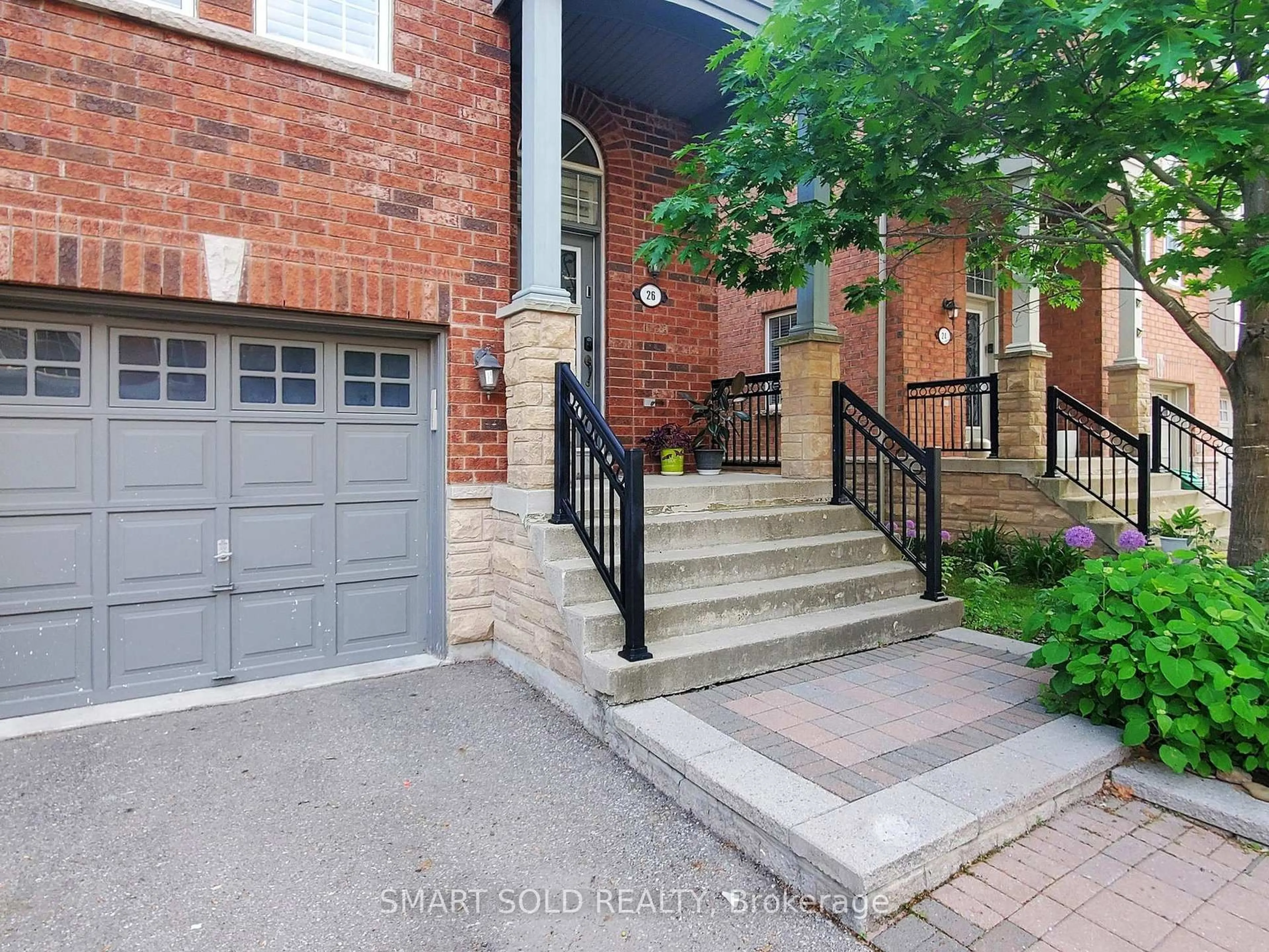 Home with brick exterior material, street for 230 Paisley Blvd #26, Mississauga Ontario L5B 0C5