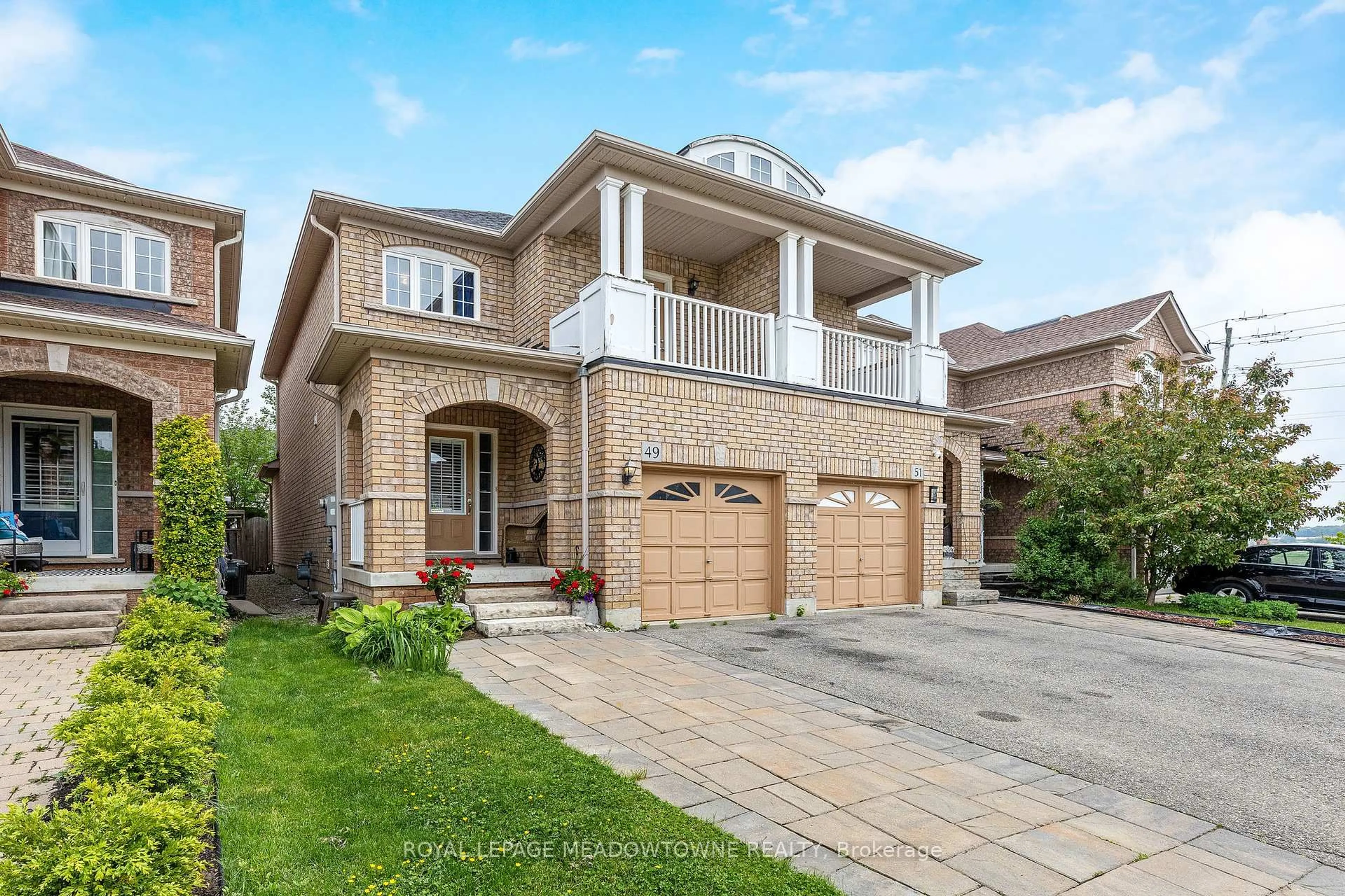 Home with brick exterior material, street for 49 Lily Lane, Halton Hills Ontario L7G 6N1
