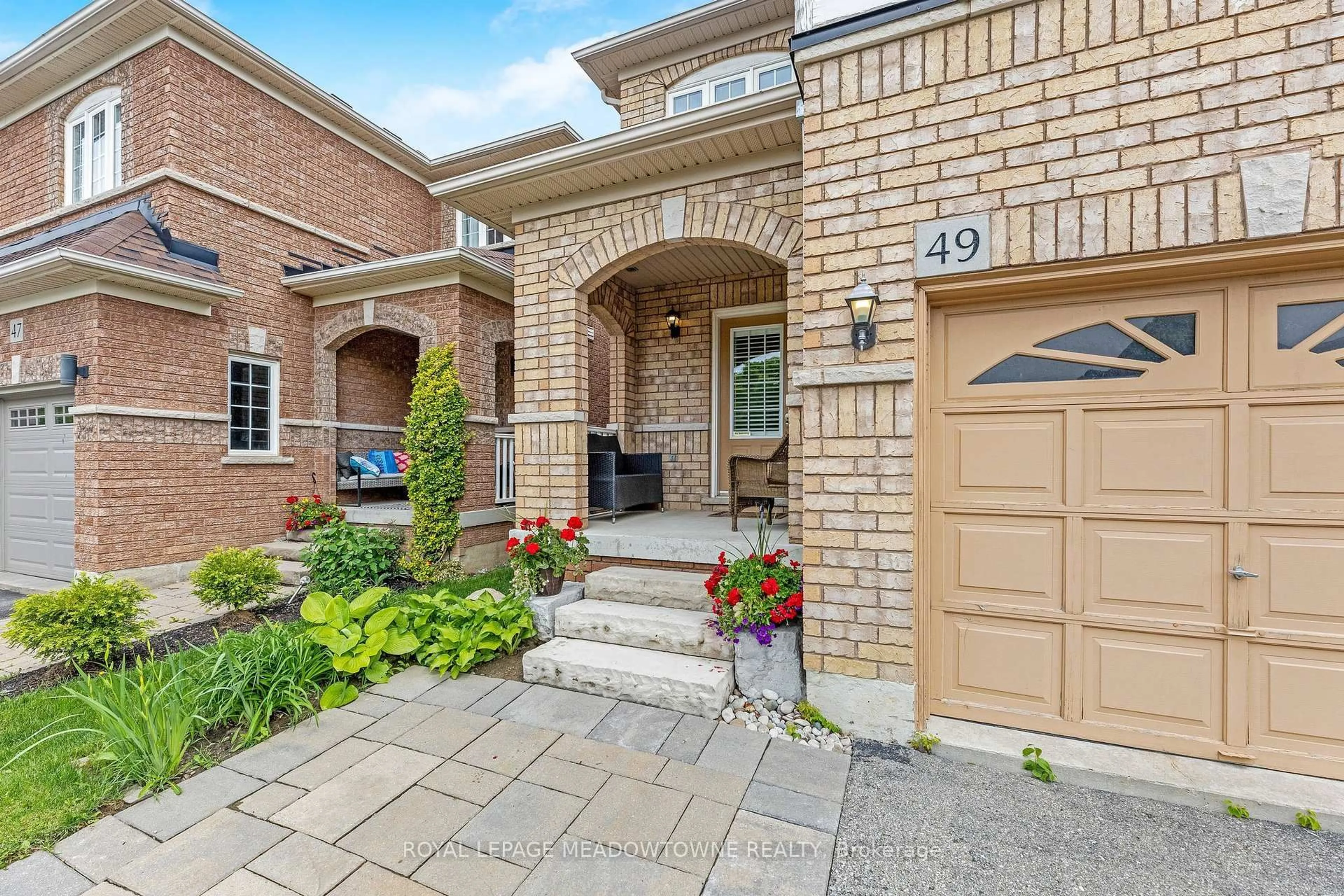 Home with brick exterior material, street for 49 Lily Lane, Halton Hills Ontario L7G 6N1