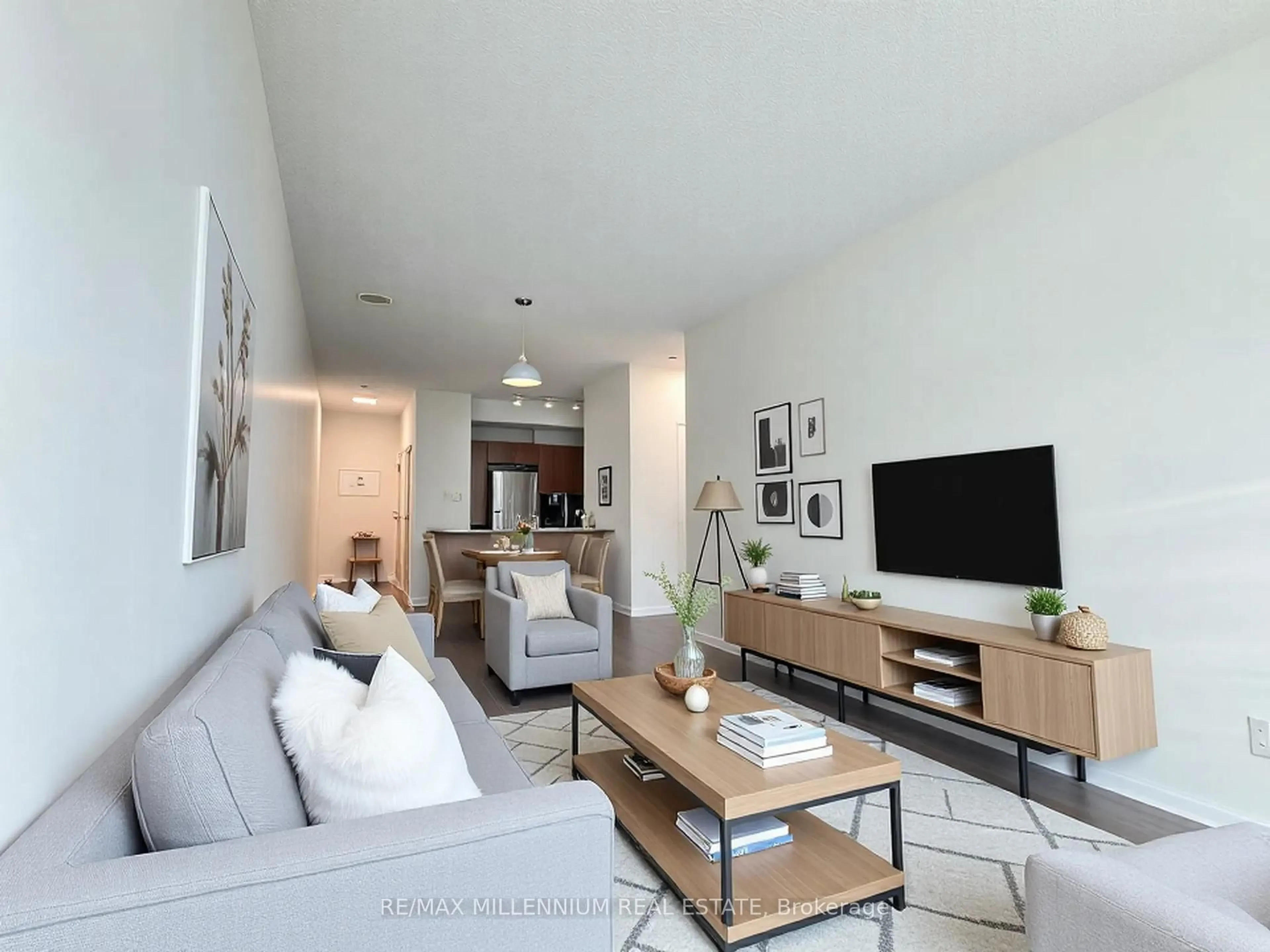 Living room with furniture, unknown for 3515 Kariya Dr #315, Mississauga Ontario L5B 0C1