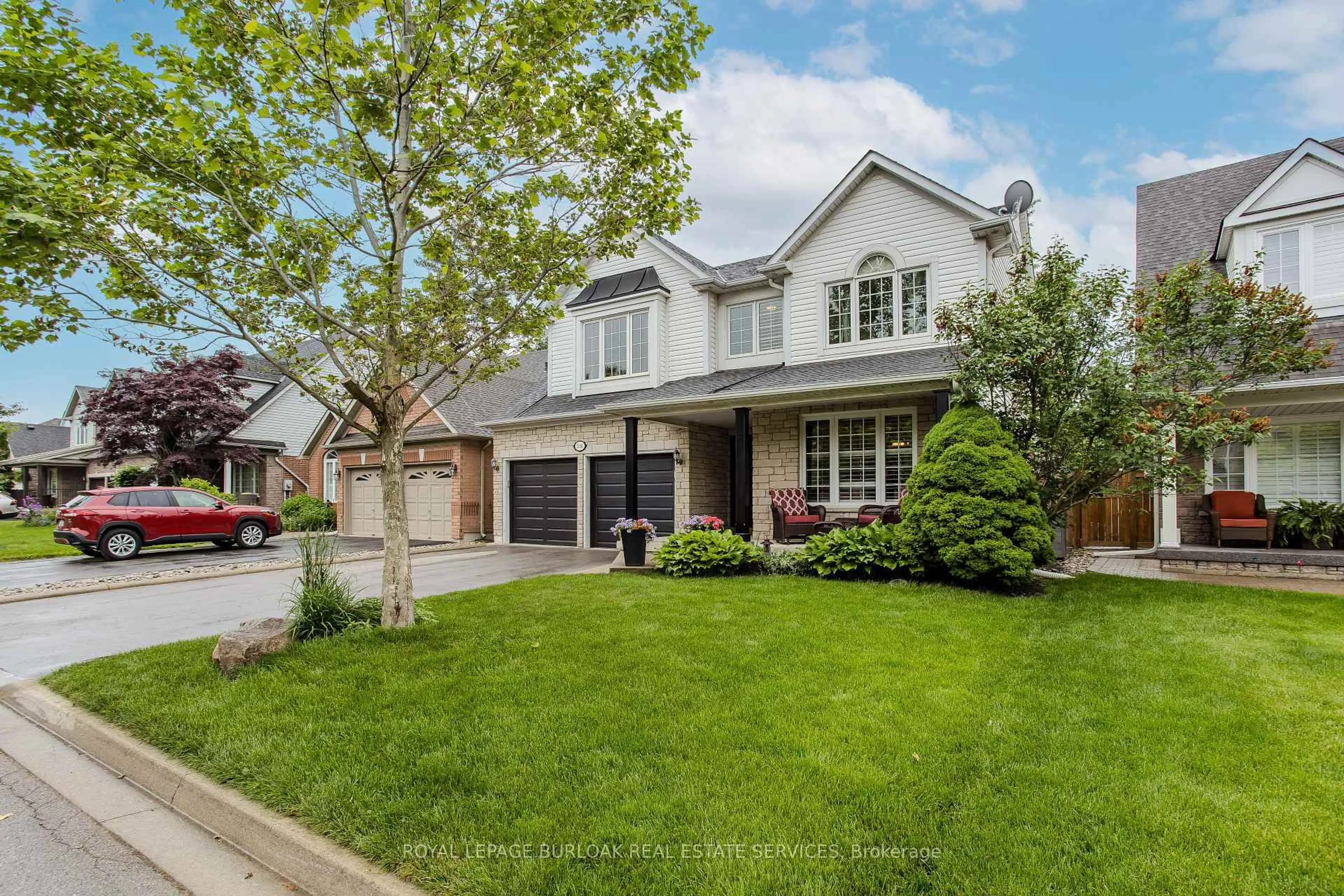 Home with brick exterior material, street for 2116 Woodsmere Crt, Burlington Ontario L7L 6J5