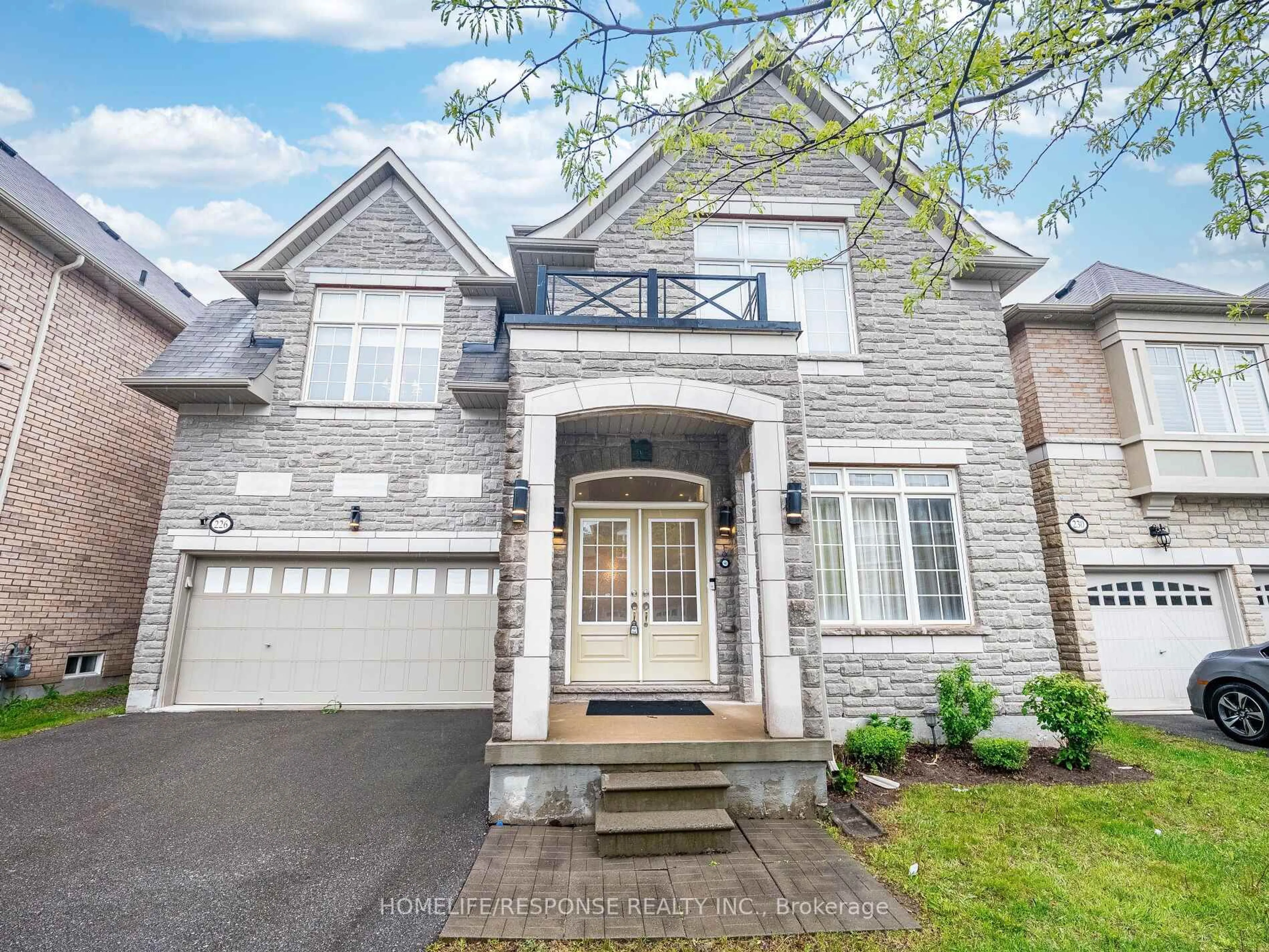 Home with brick exterior material, street for 226 JESSIE CAVERHILL Passage, Oakville Ontario L7M 0Z6