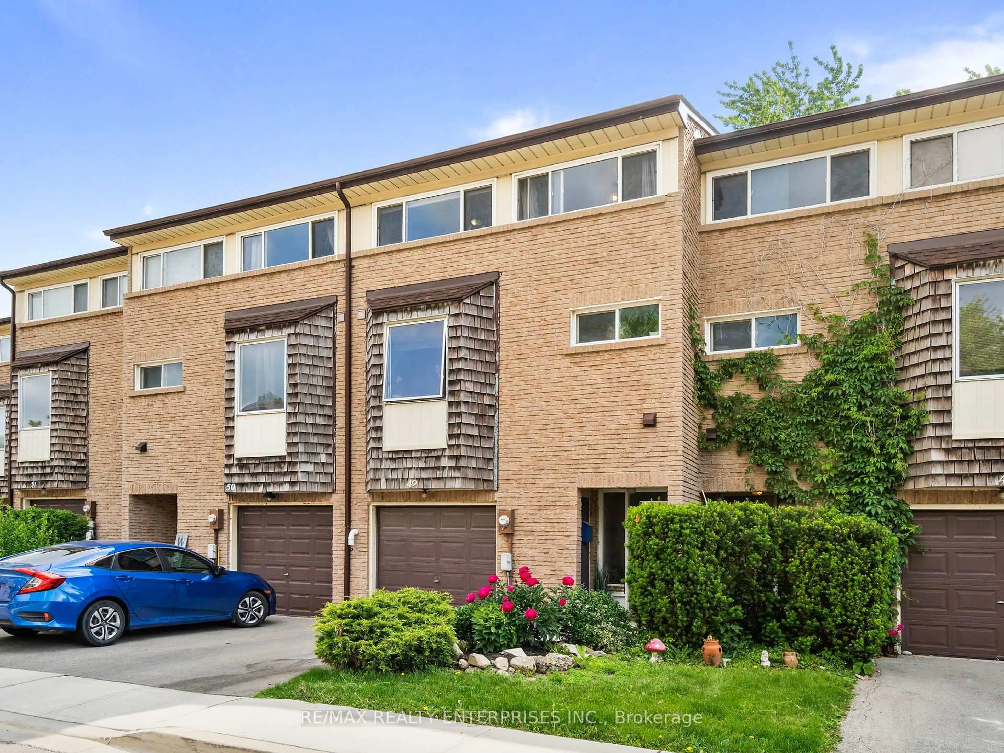 Home with brick exterior material, street for 661 Childs Dr #49, Milton Ontario L9T 4Y4