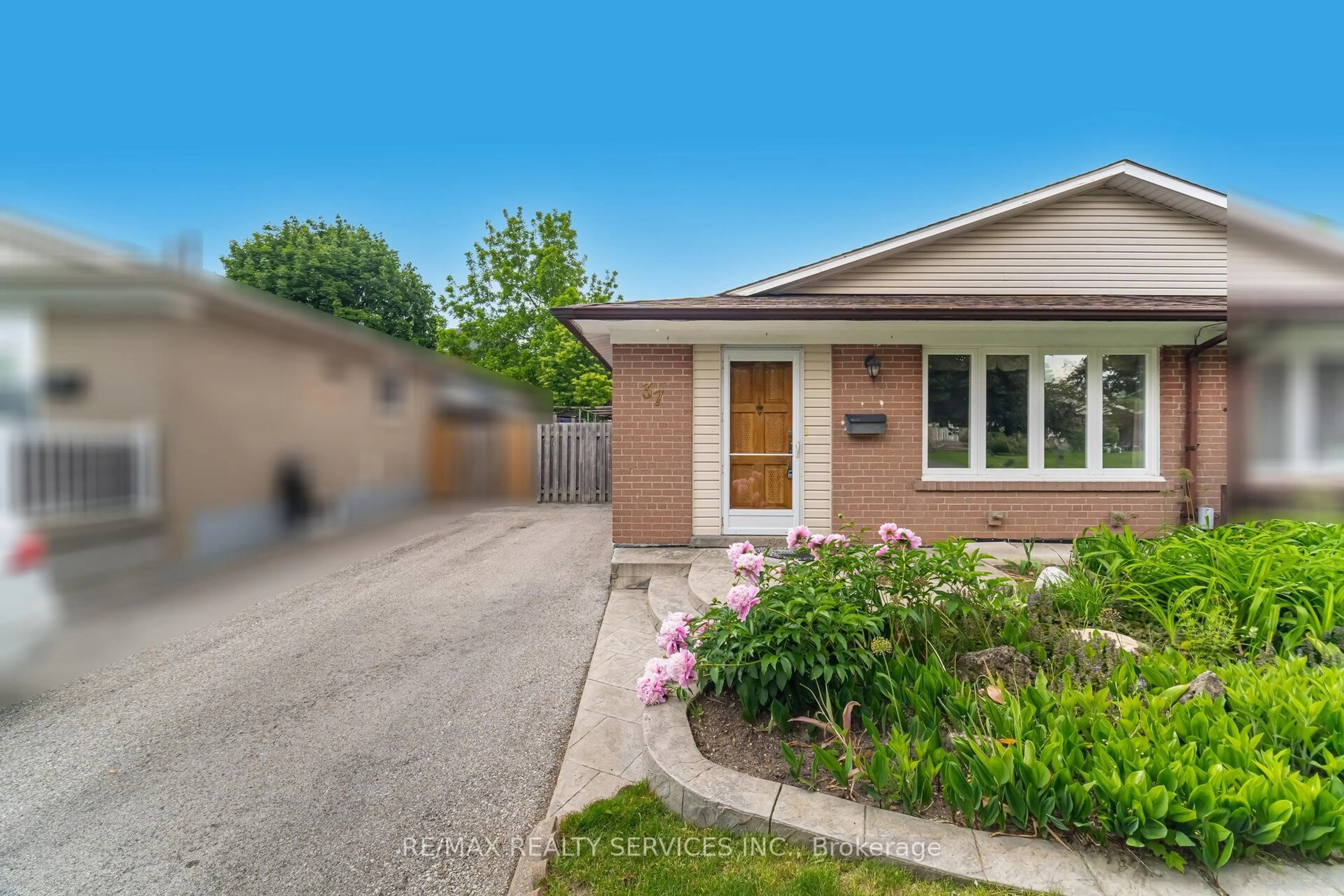 Home with brick exterior material, street for 37 Welbeck Dr, Brampton Ontario L6X 2K9