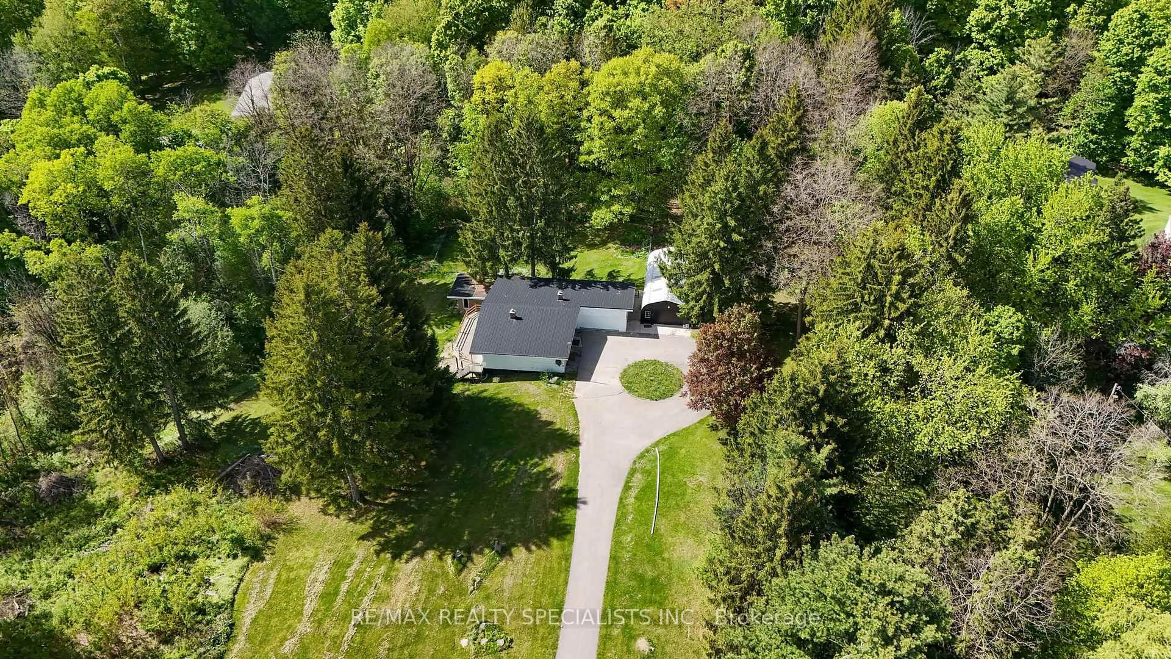 A pic from outside/outdoor area/front of a property/back of a property/a pic from drone, street for 7062 Castlederg Sdrd, Caledon Ontario L7C 0P4