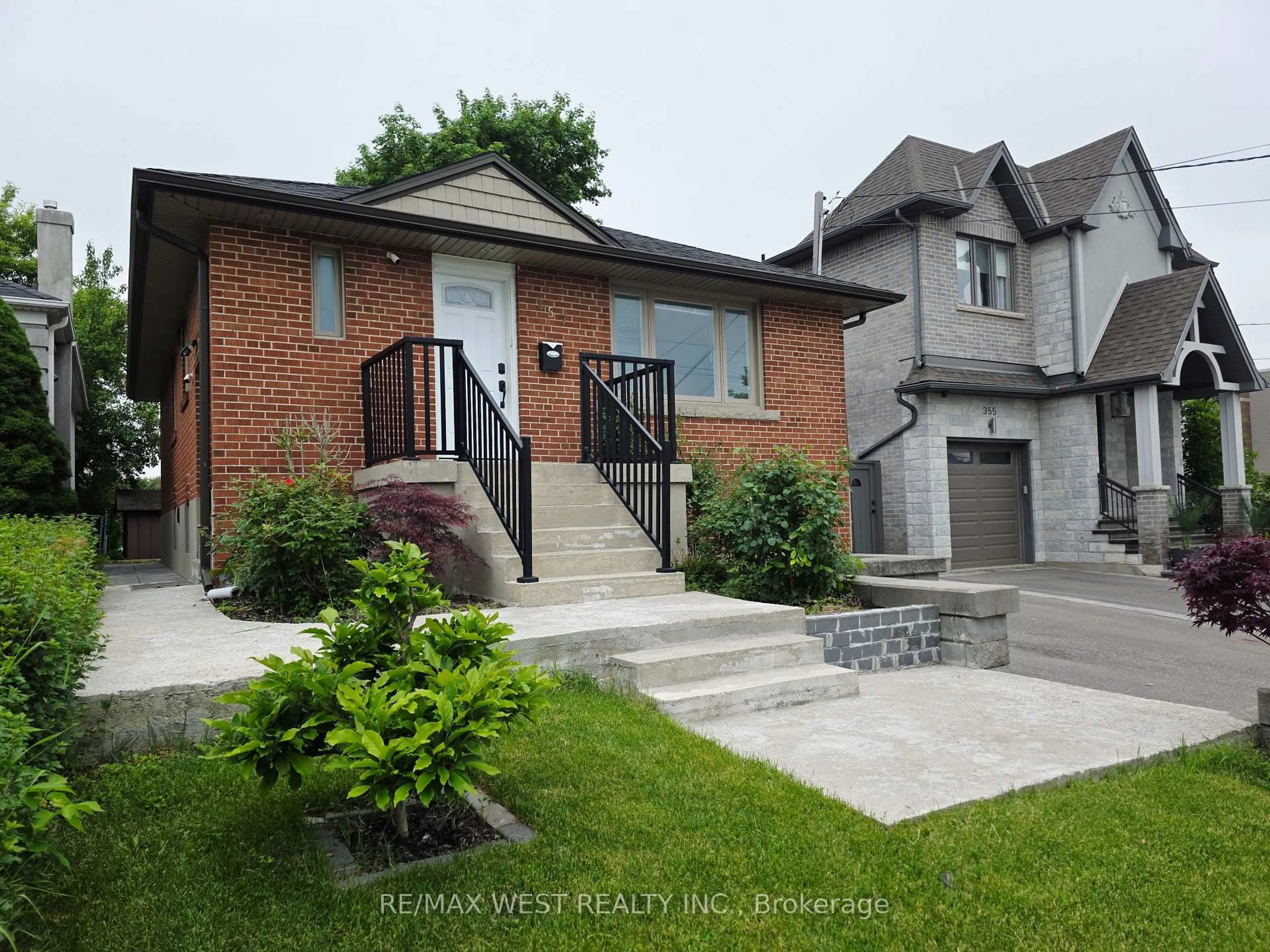 Home with brick exterior material, street for 357 Rustic Rd, Toronto Ontario M6L 1W6