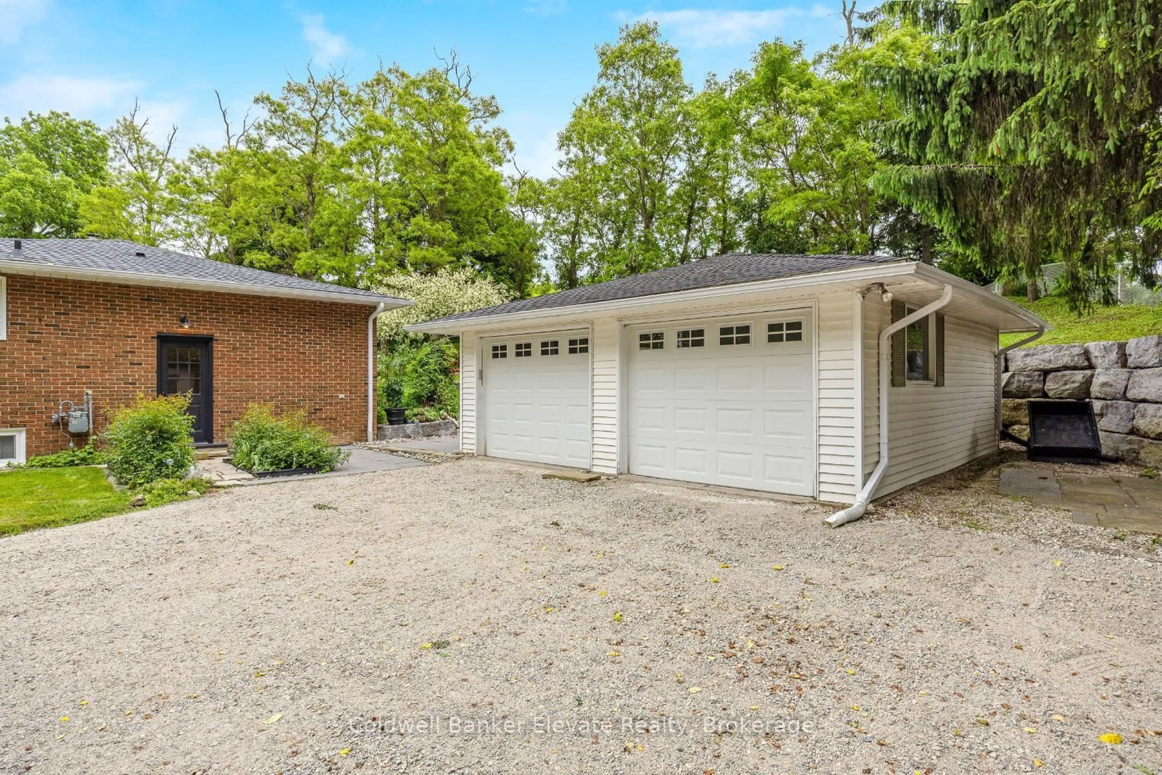 Home with brick exterior material, street for 25 Caroline St, Halton Hills Ontario L7G 2J5